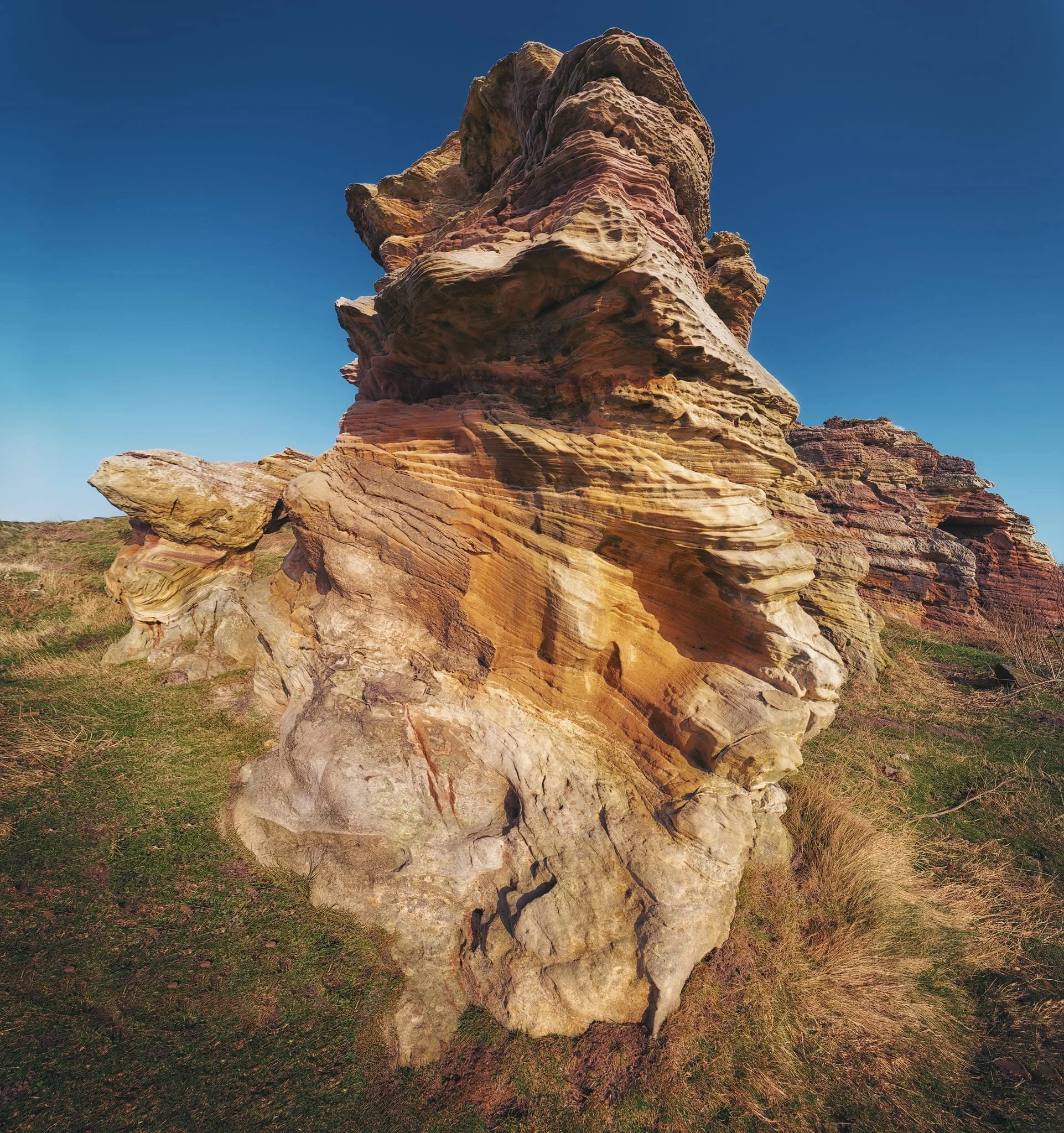 For this unique view of the caves’ southwestern profile I shot seven landscape photos, stacked top to bottom, to create this ultra-expansive vertorama.