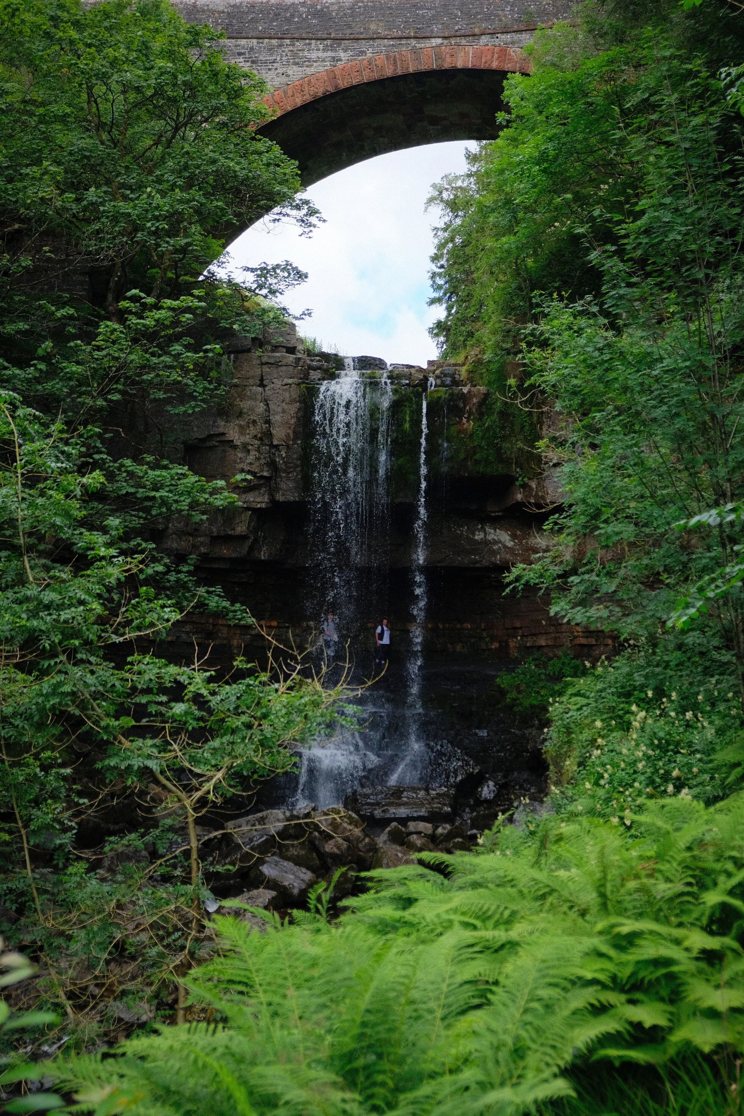  The waterfall is beautifully framed by the gorge it&rsquo;s set in and the bridge above it. 