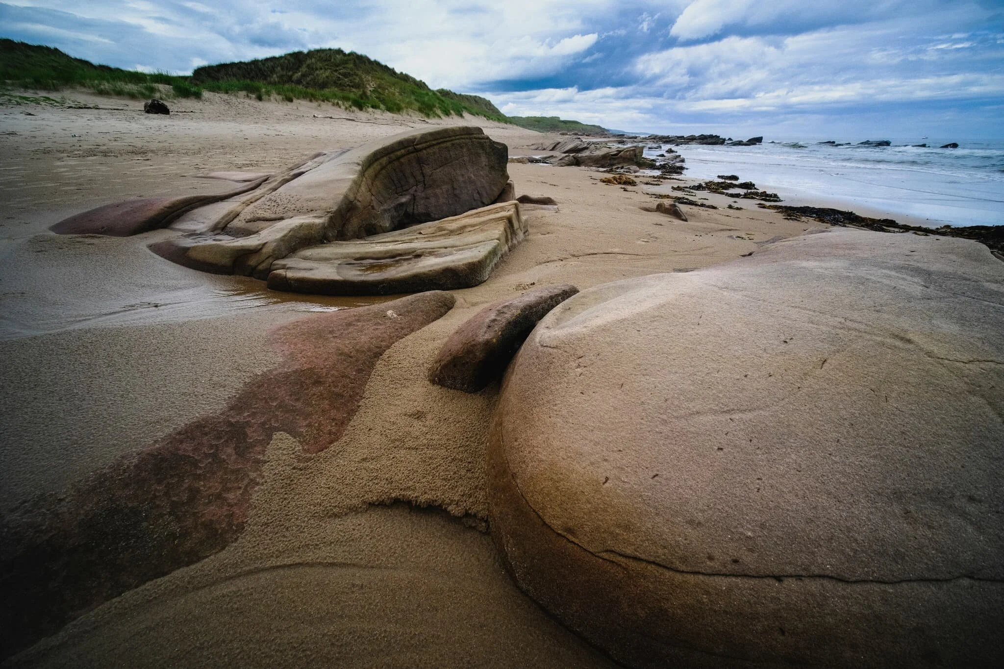 It’s not very often I get to keep my ultra-wide 9mm lens on and play around with strange rock shapes and near-far photographic compositions. Loads of fun!