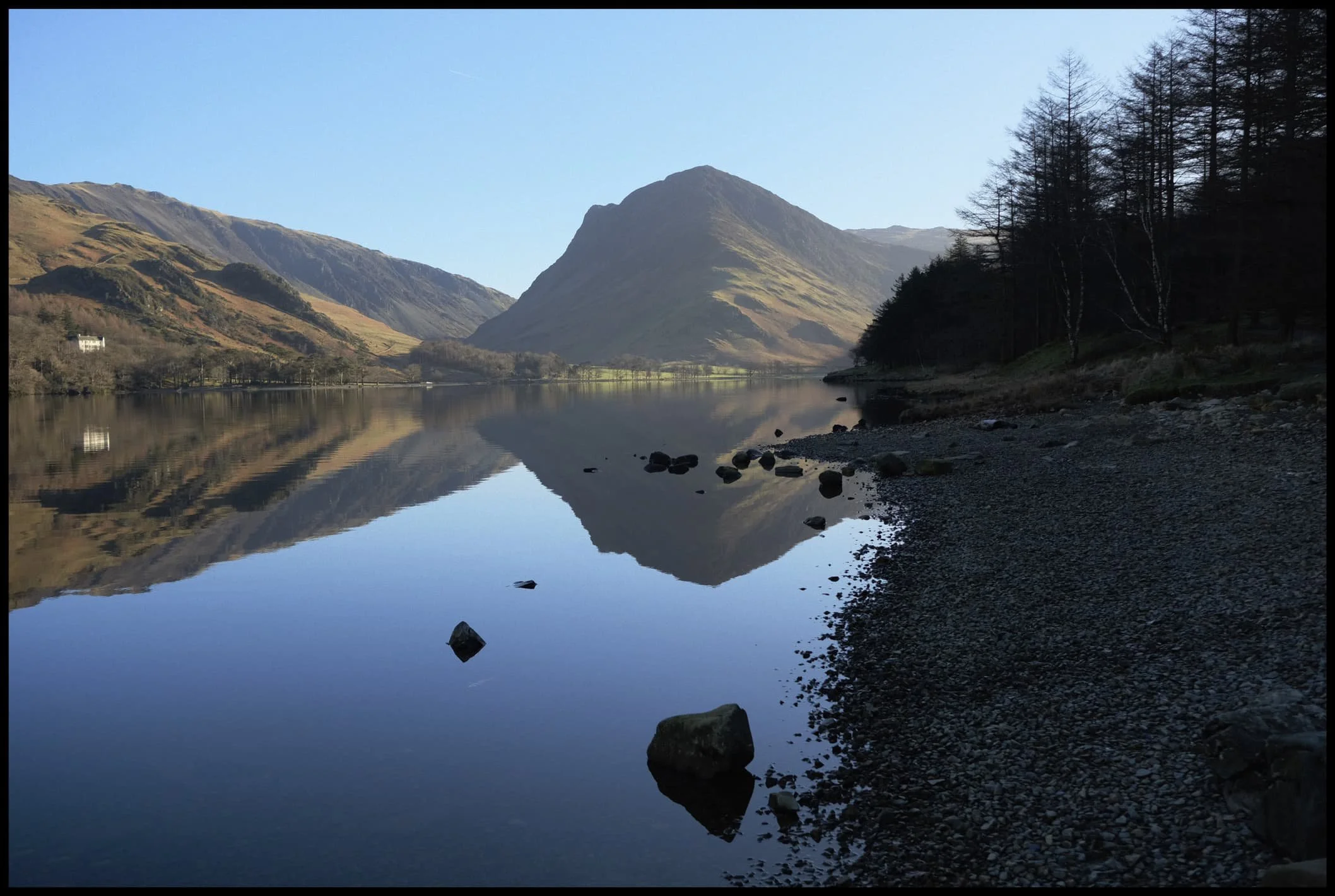  Buttermere is ringed by so many distinctive fells, but arguably the one that commands your attention the most is Fleetwith Pike, seen here perfectly reflected in Buttermere&rsquo;s waters. 