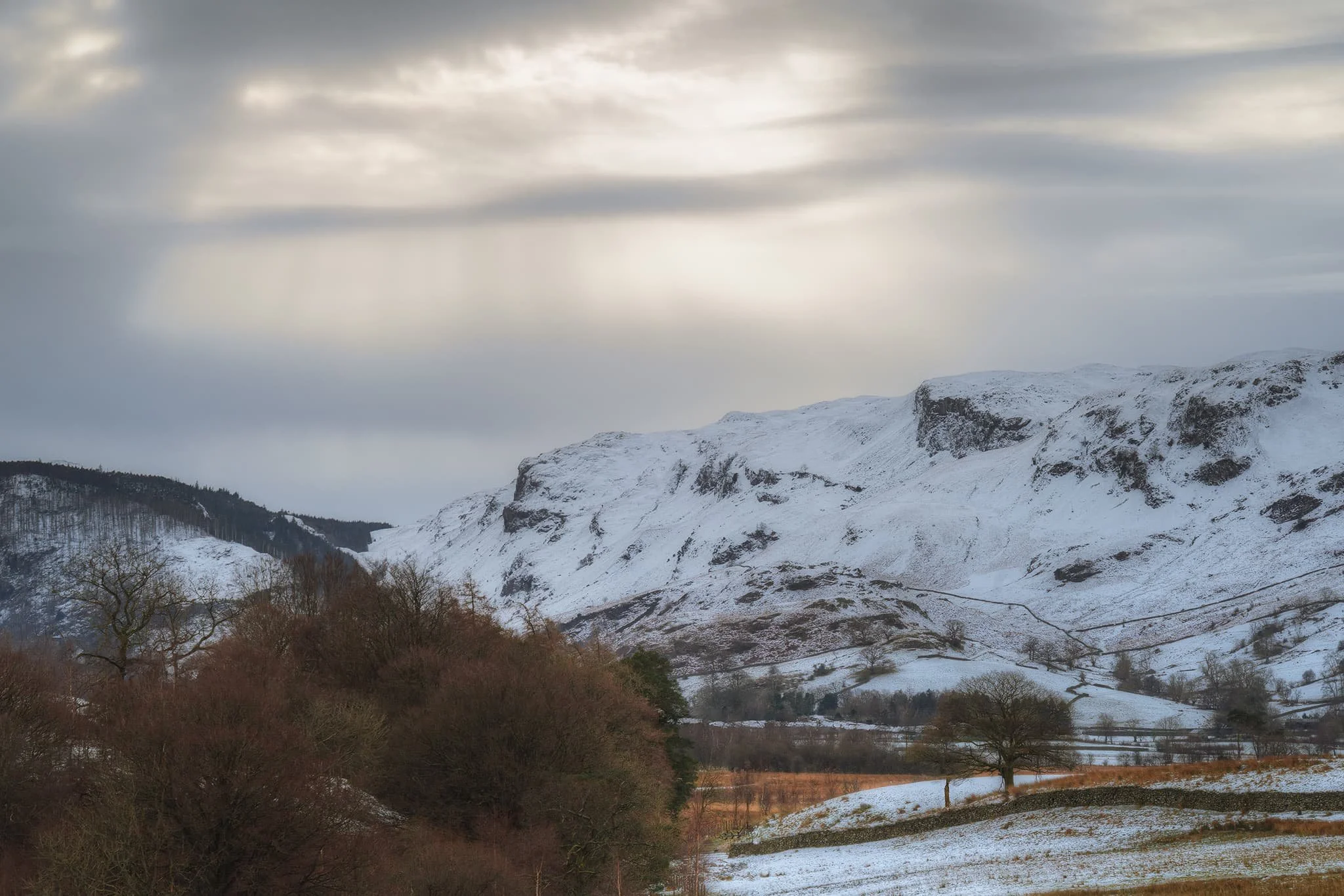 The last of the light, looking back towards the Thirlmere fells. Layers of cloud temporarily reveal the sun in the form of crepuscular rays of &ldquo;God rays&rdquo;. Just truly magical. 