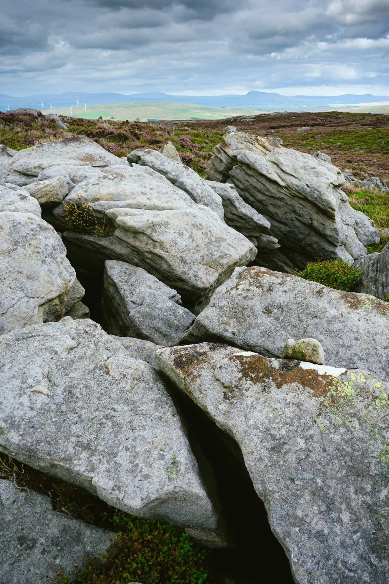  Making our way onto Clougha Fell, I had lots of fun making compositions from all the gritstone formations dotted about everywhere, such as with these boulders and the Yorkshire Dales Three Peaks in the distance. 