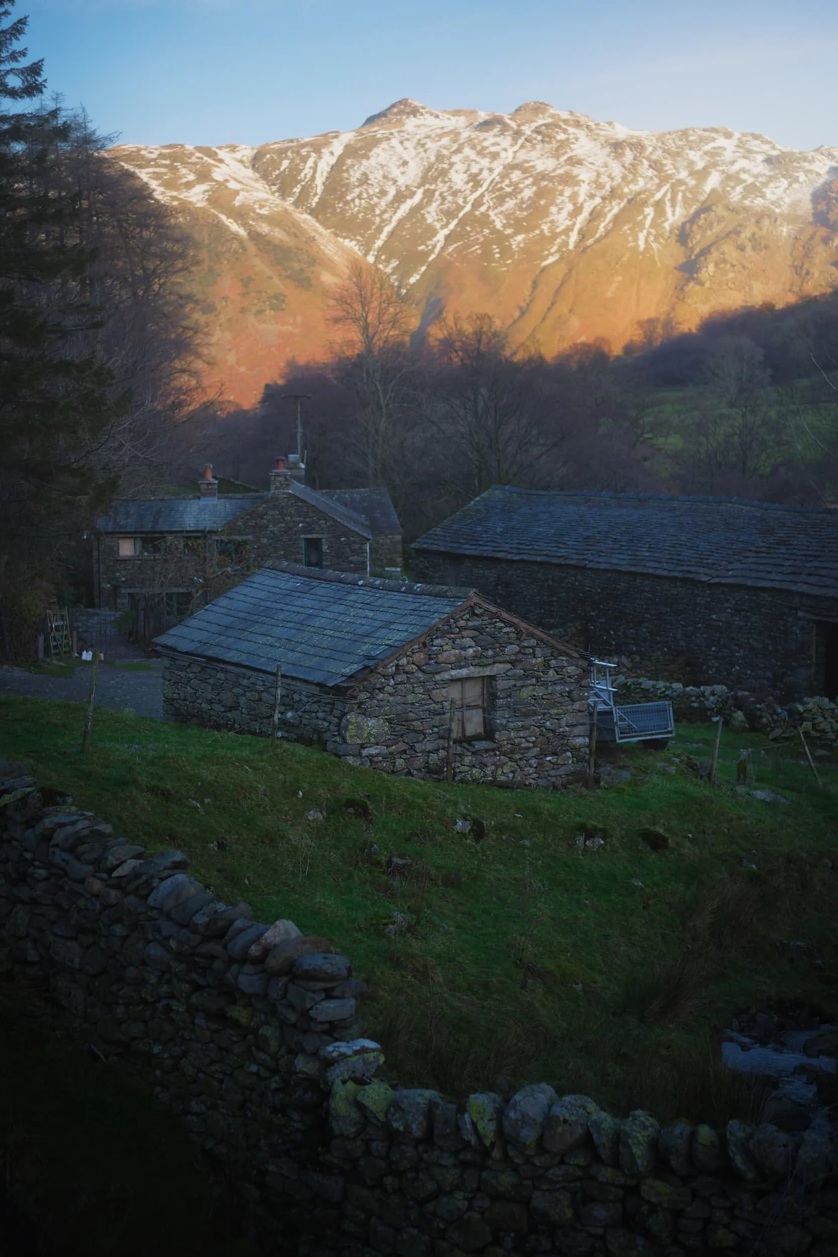 A tighter 35mm composition of Angletarn Pikes allows me to also features some of the old barns and farm houses of Wall End.