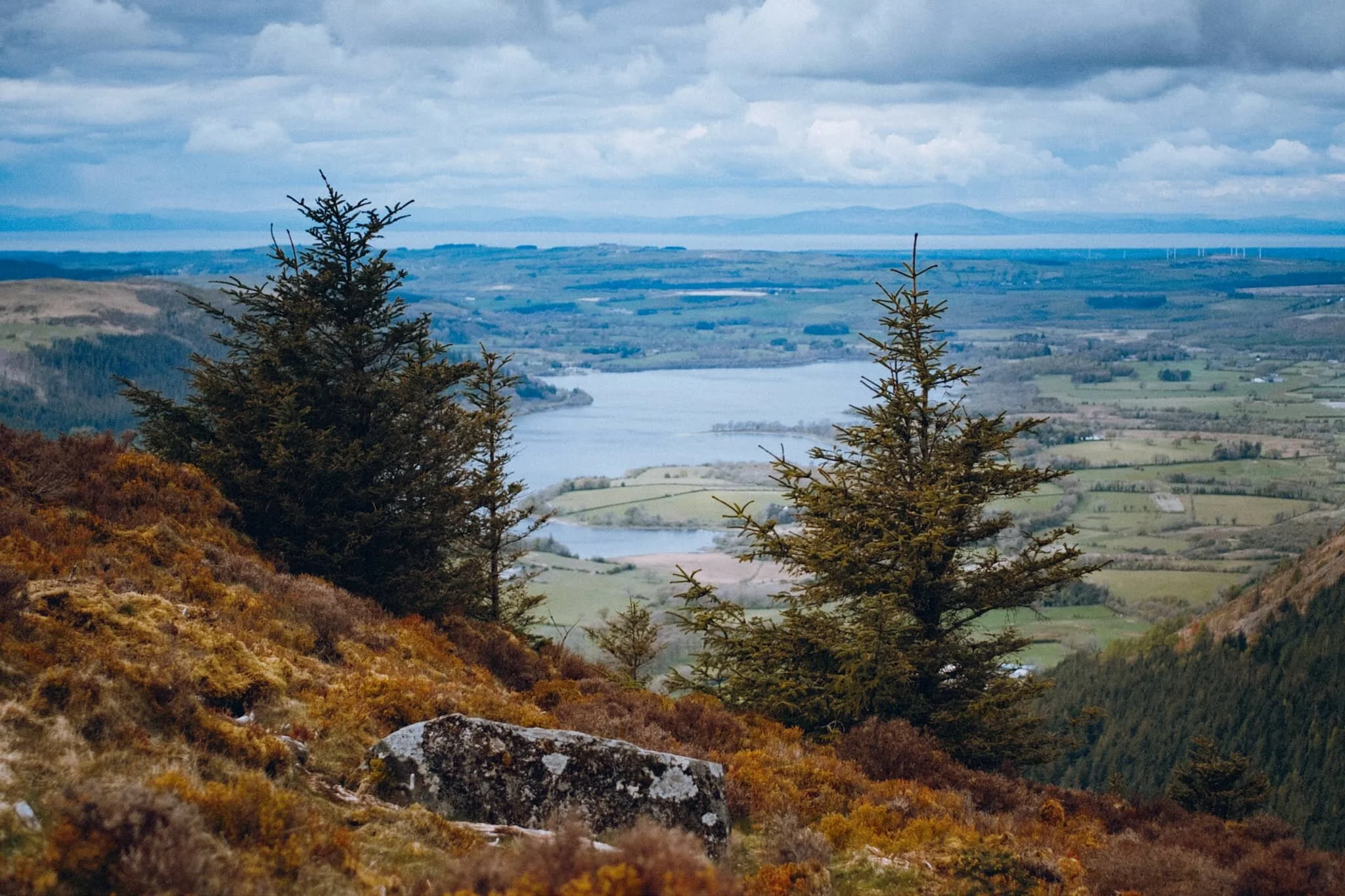 Bassenthwaite Lake framed by two trees; famously cited as the only “lake” in the Lake District (that is, the only lake with the word “lake” in its name). The atmosphere was so clear you could also make out the Solway Firth and the Galloway mountains in Scotland.