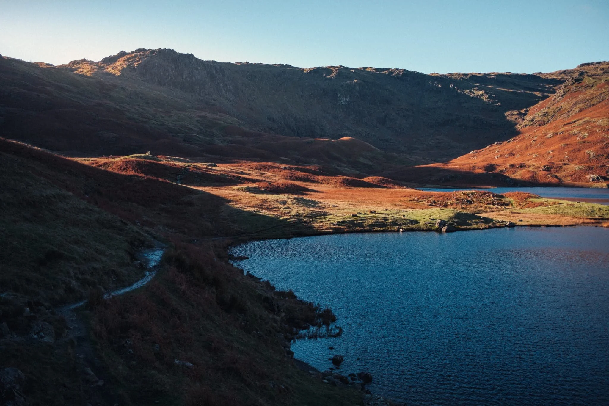  Adventurous hikers have the option of taking the path all the way around Easedale Tarn and up towards Codale Tarn on the way to High Raise. For us, we crossed the beck flowing out of Easedale Tarn and followed the less-travelled path towards Far Easedale. 