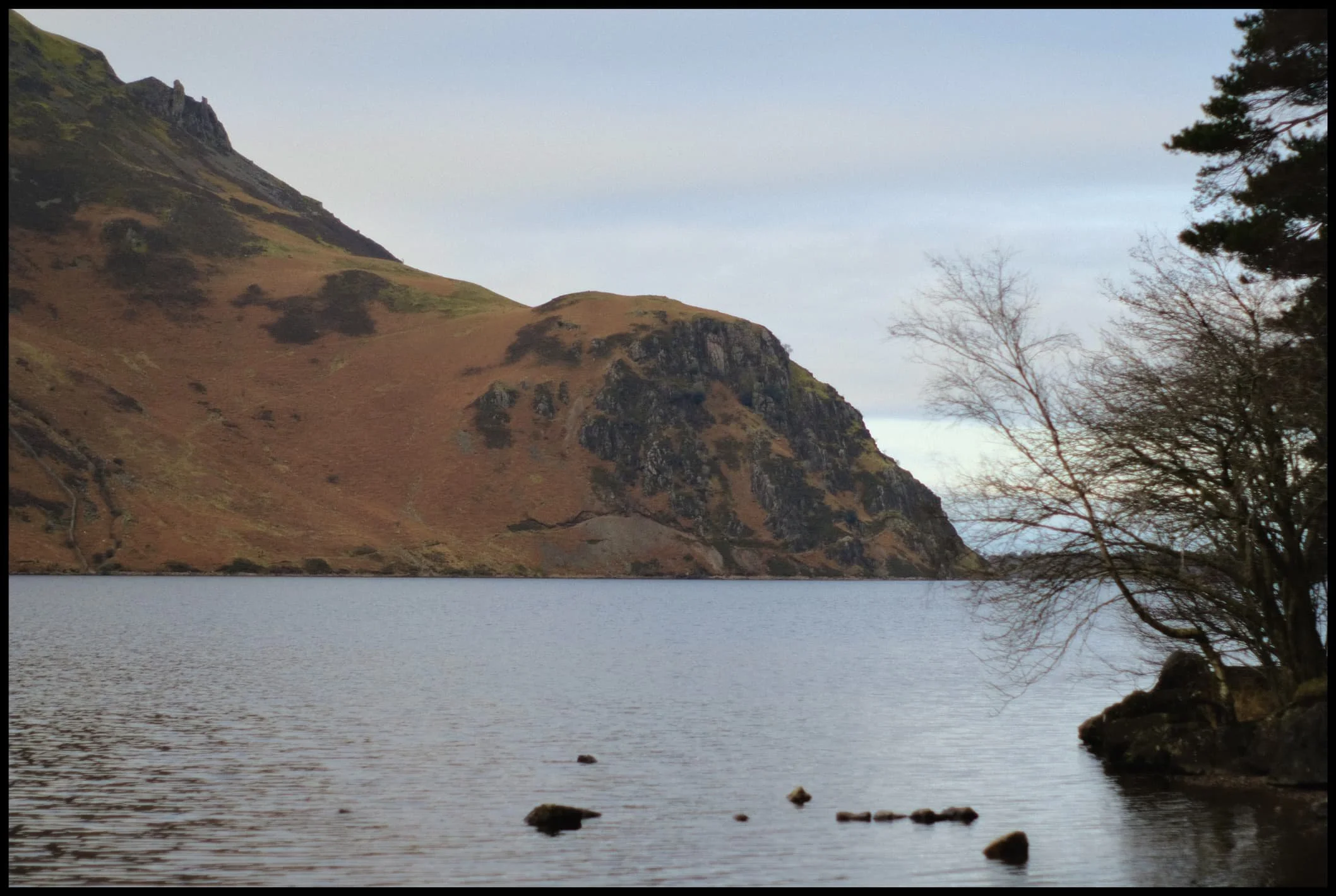  A closer view of Angler Crag. It is technically possible to complete a circular hike around Ennerdale Water, but the difficulty is in navigating around this awkward crag. 