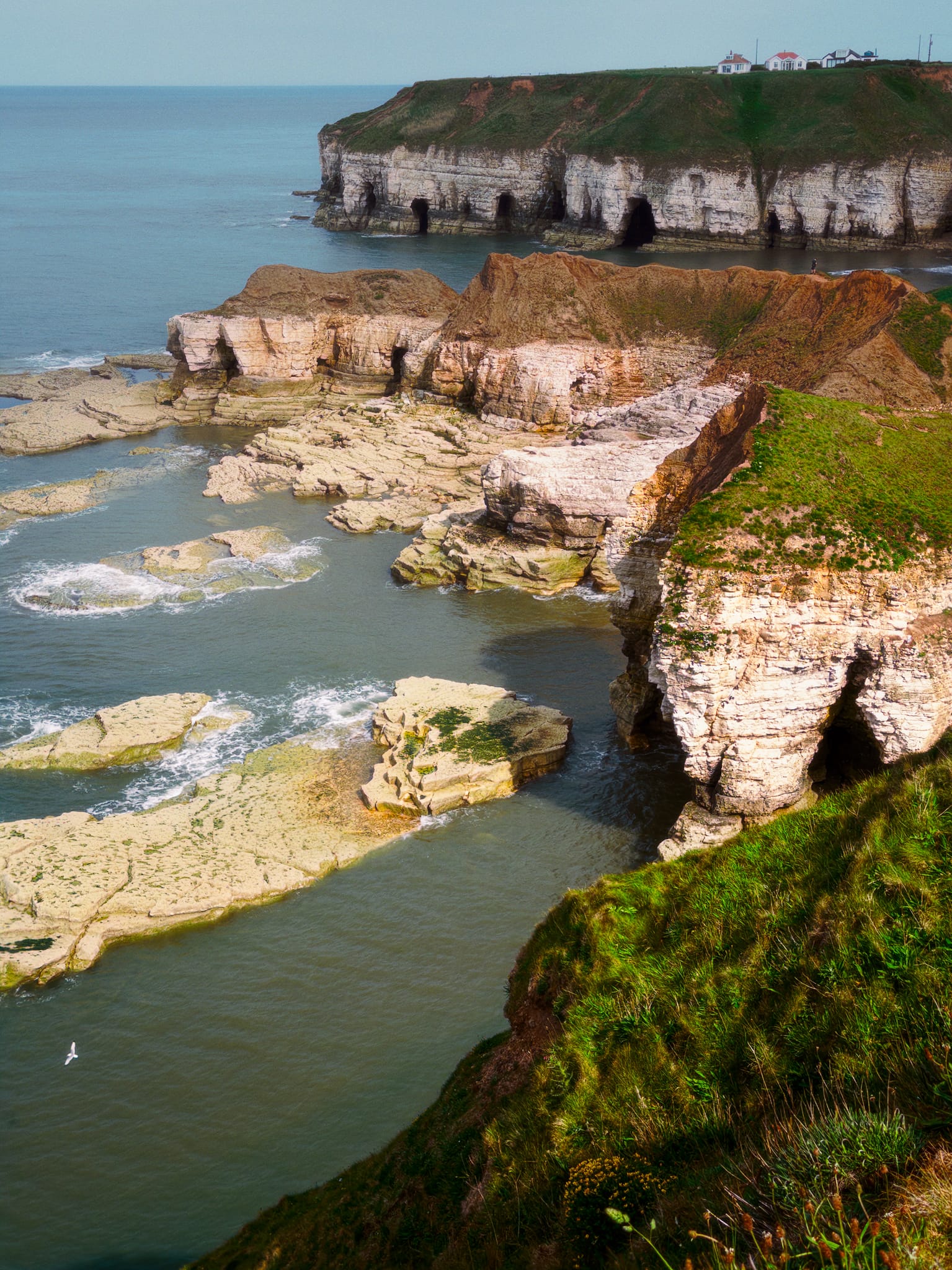 An incredible view. Near, the cliffs and Nab of Thornwick Bay, with the bay&rsquo;s eastern cliffs in the distance. Not a bad spot for a house&hellip; if you&rsquo;re confident they&rsquo;ll remain in place for long enough.