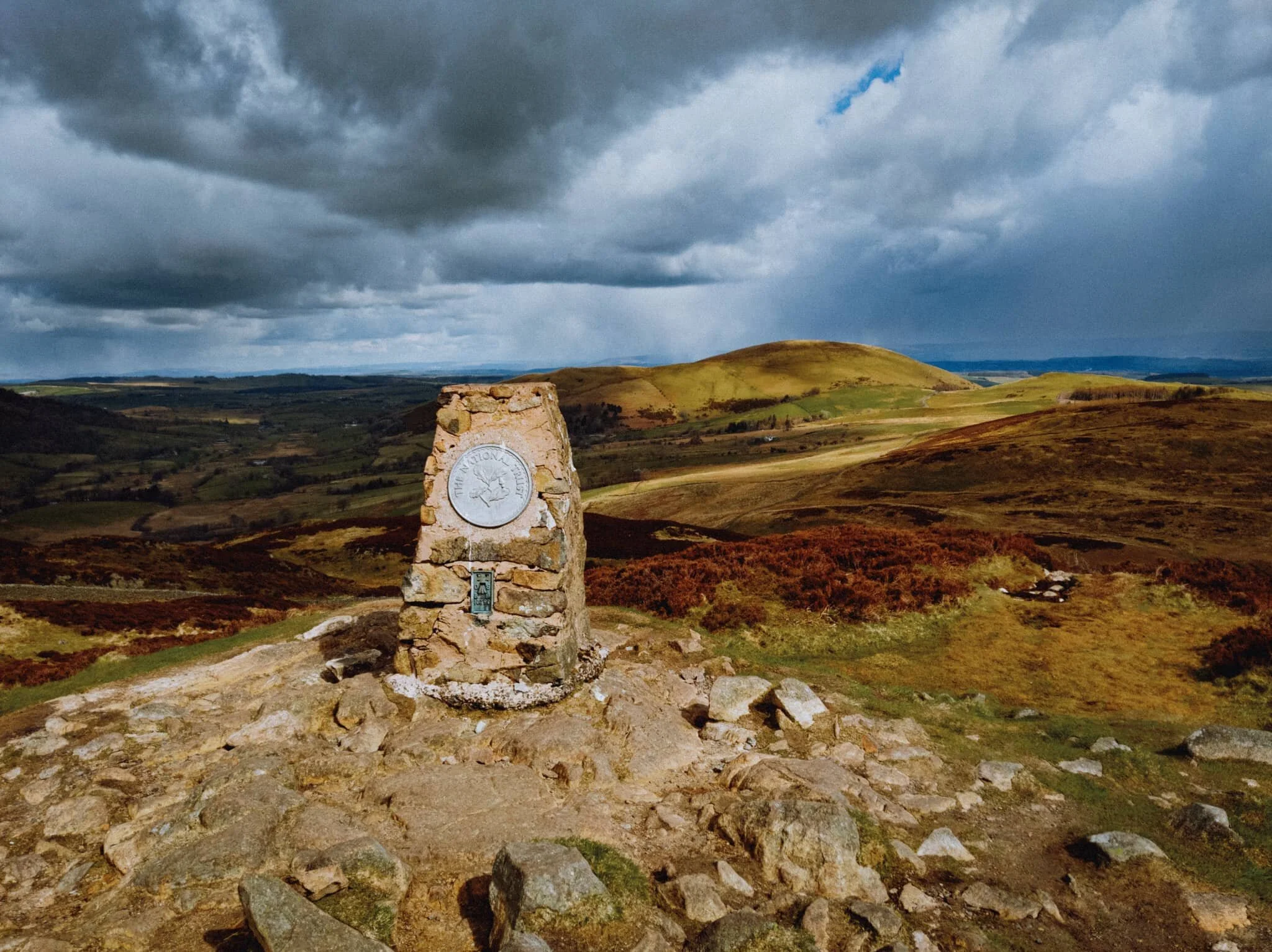 And eventually… summit! This is Airy Crag, the peak of Gowbarrow Fell. The views are expansive and exceptional; from here it’s easy to pick out not just the northern fells of the Lake District but also right across the Eden valley to the Northern Pennines. That also meant we could see the dark clouds steadily moving towards us.