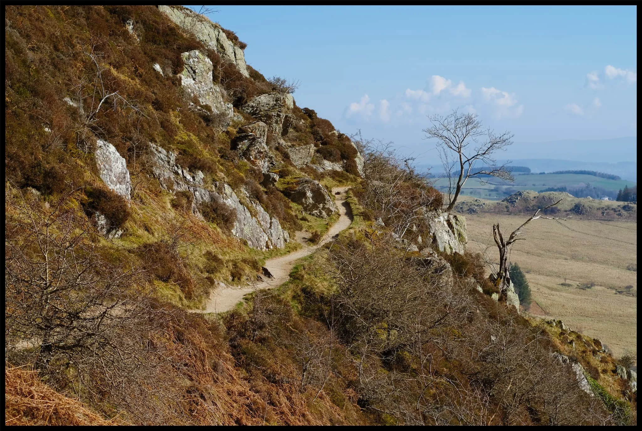  After the summit it was a simple task of following the narrow winding footpath around Gowbarrow&rsquo;s northern and eastern shoulder. In places, the drop from the footpath is rather precipitous. 