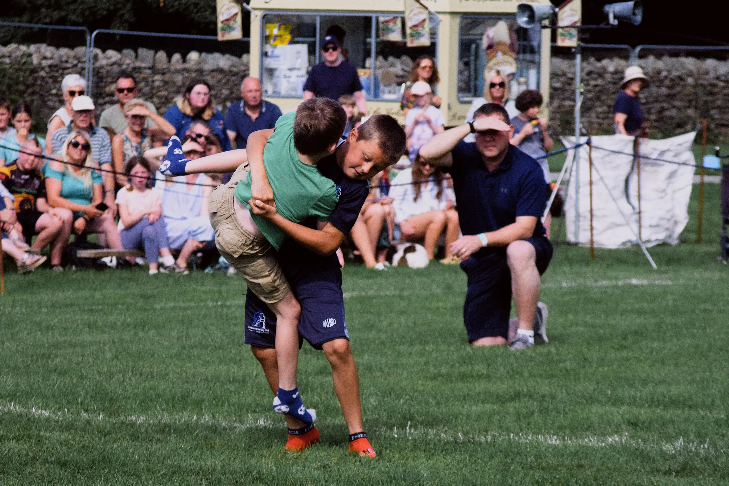  Once the grip is taken the umpire gives the signal to start the contest by calling 