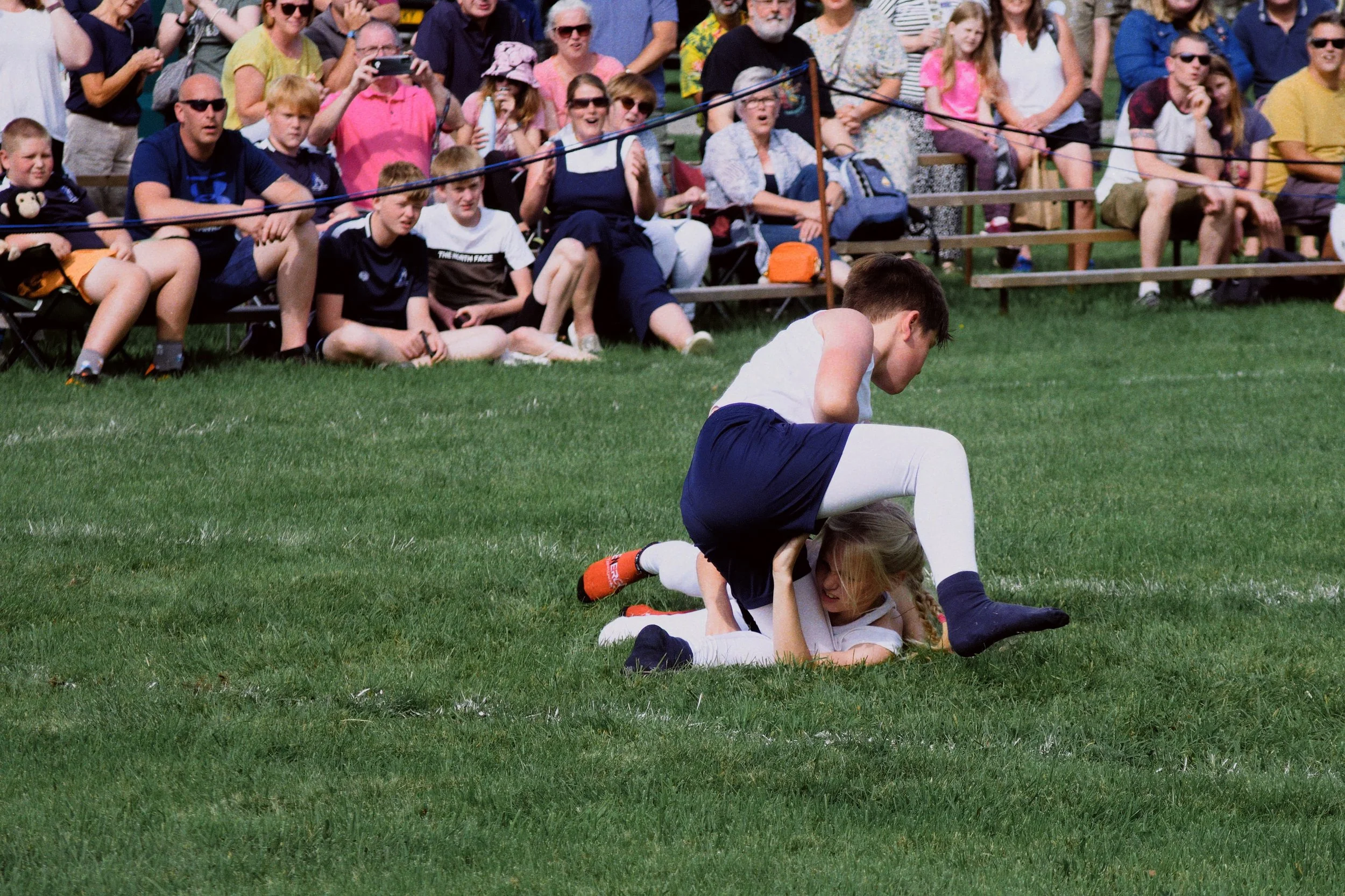  Ultimately, the young lad takes Gold after a hard-fought bout. 