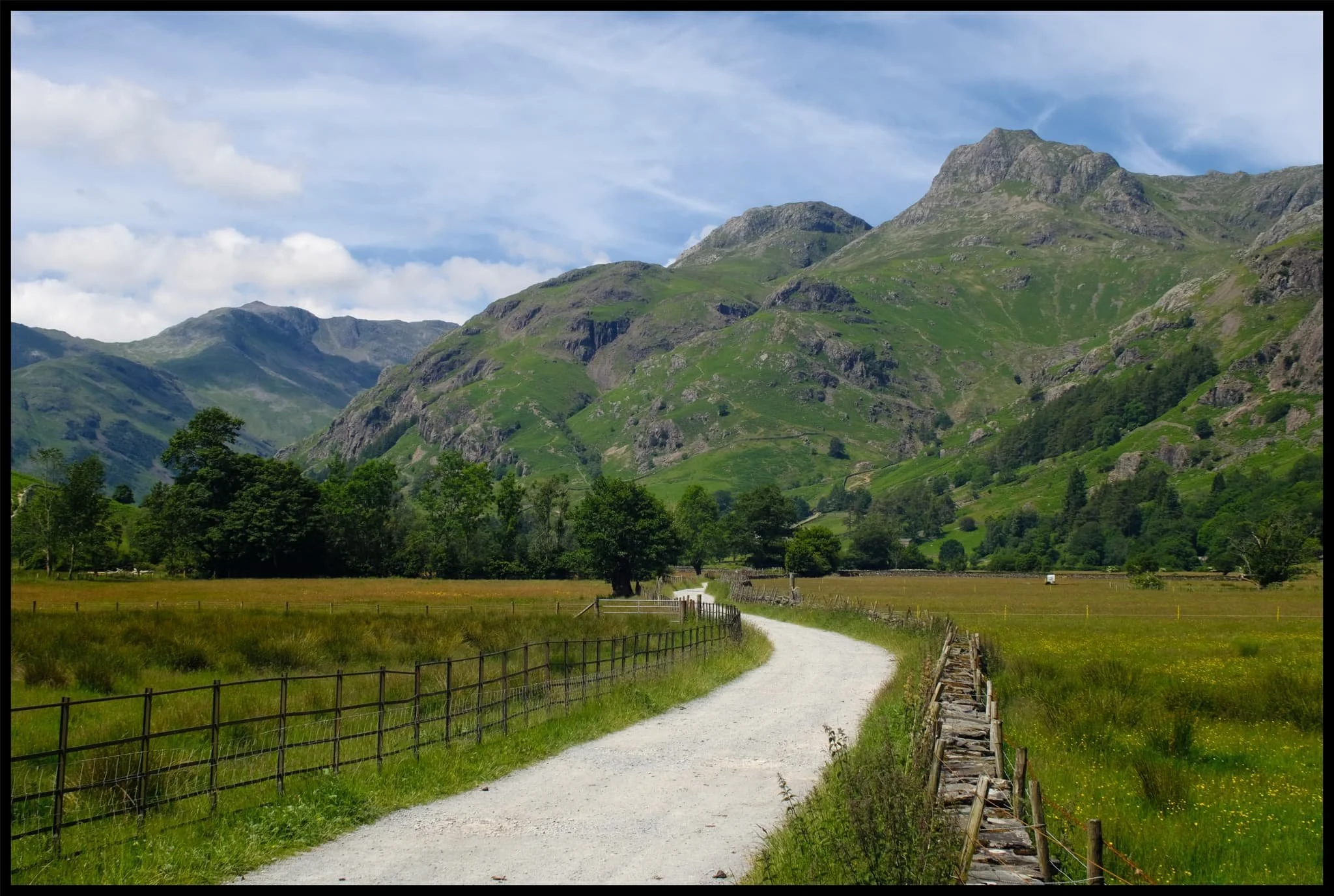  The fist-like crags of the Langdale Pikes to the right, Bowfell to the left. 