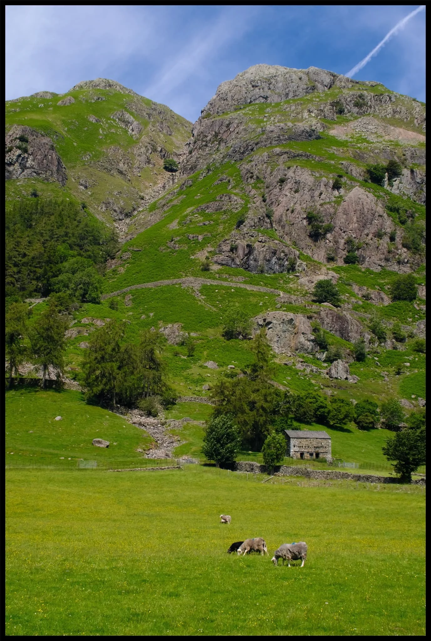  Whitegill Crag stands protectively over the valley floor and its inhabitants. 