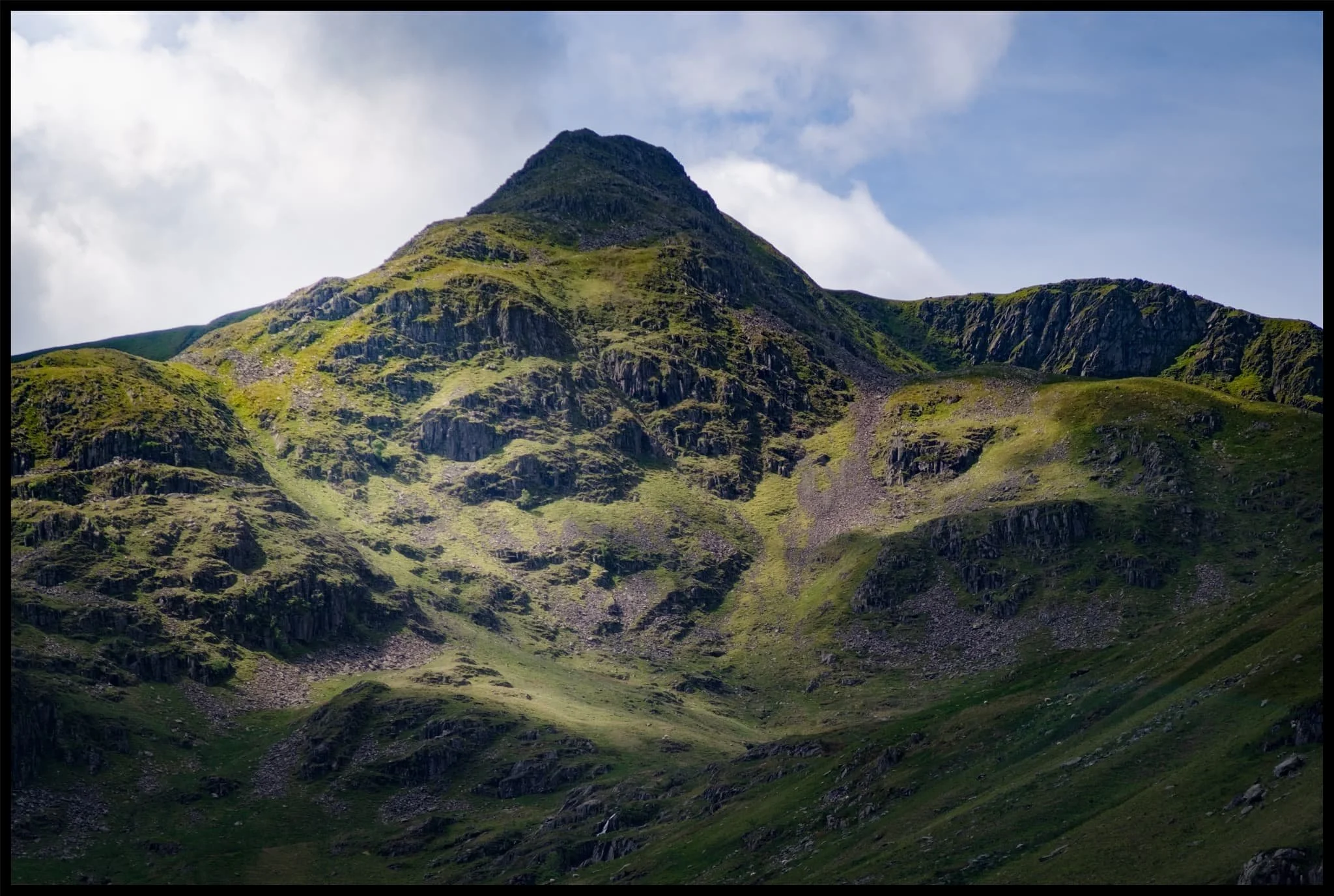  Dollywaggon Pike, punching the sky, cast in light and shadow. The joy of exploring the scenery at 105mm. 