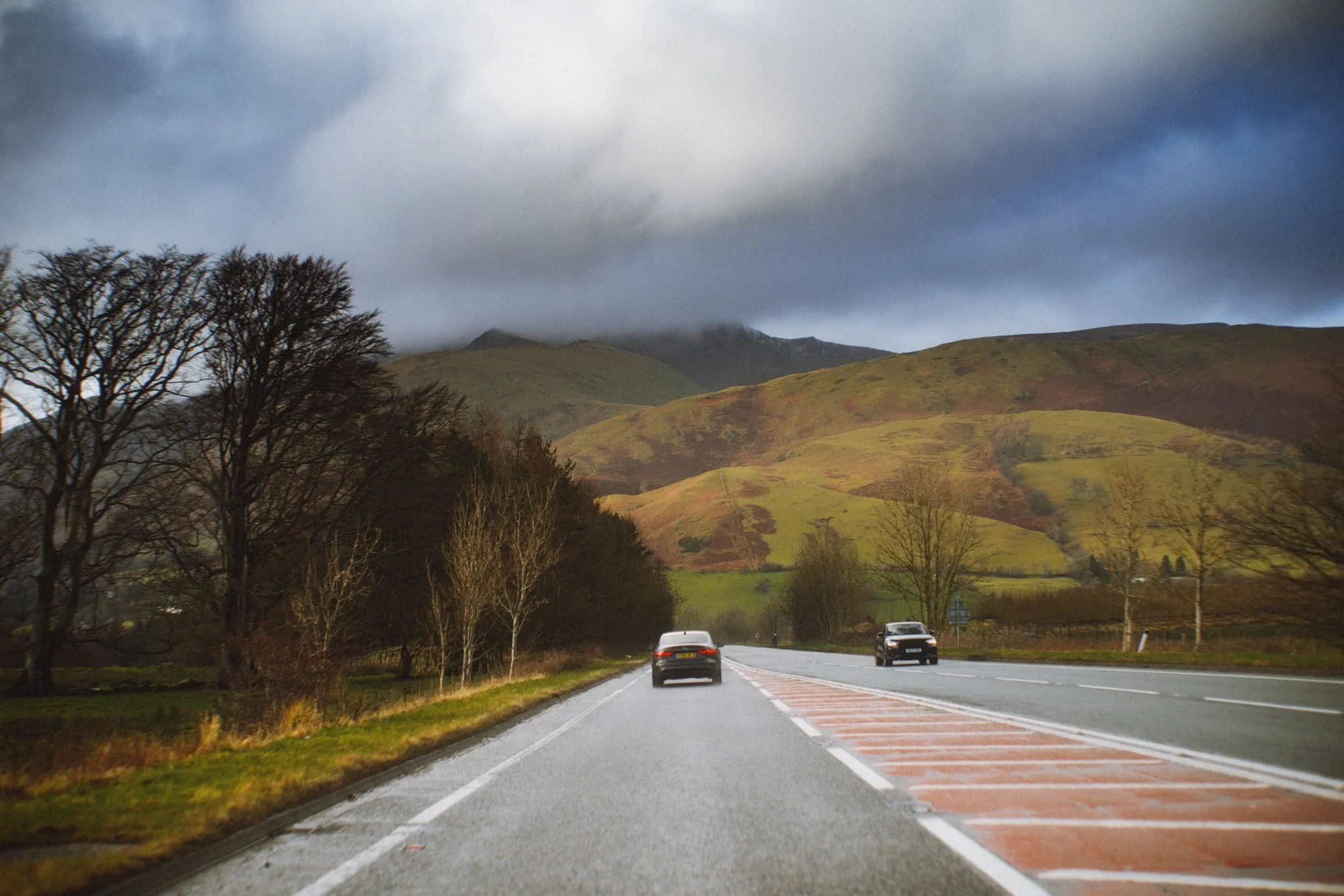  We elected for the scenic route back to Kendal, heading north out of Patterdale, through Matterdale, and onto the A65. That way we could turn off to head down St. John&rsquo;s in the Vale and join the A591 back to Kendal. I kept my camera out, with the 55m attached to it, and grabbed this epic scene of Blencathra from the passenger&rsquo;s side. 