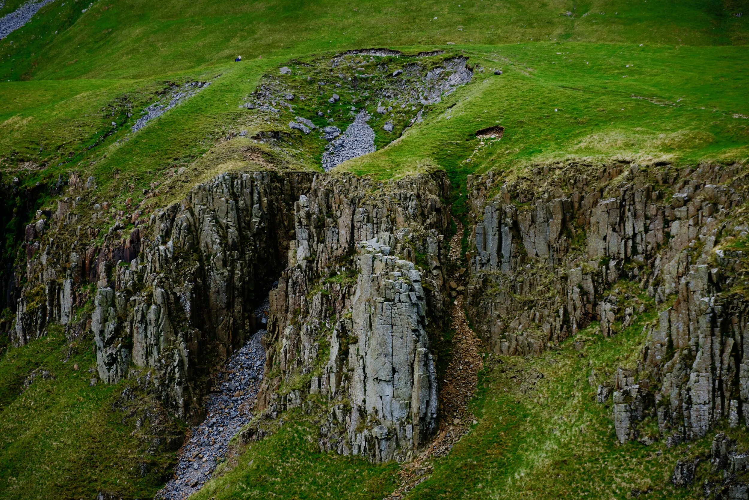  More fellwalkers make their way towards the head of High Cup Nick. 