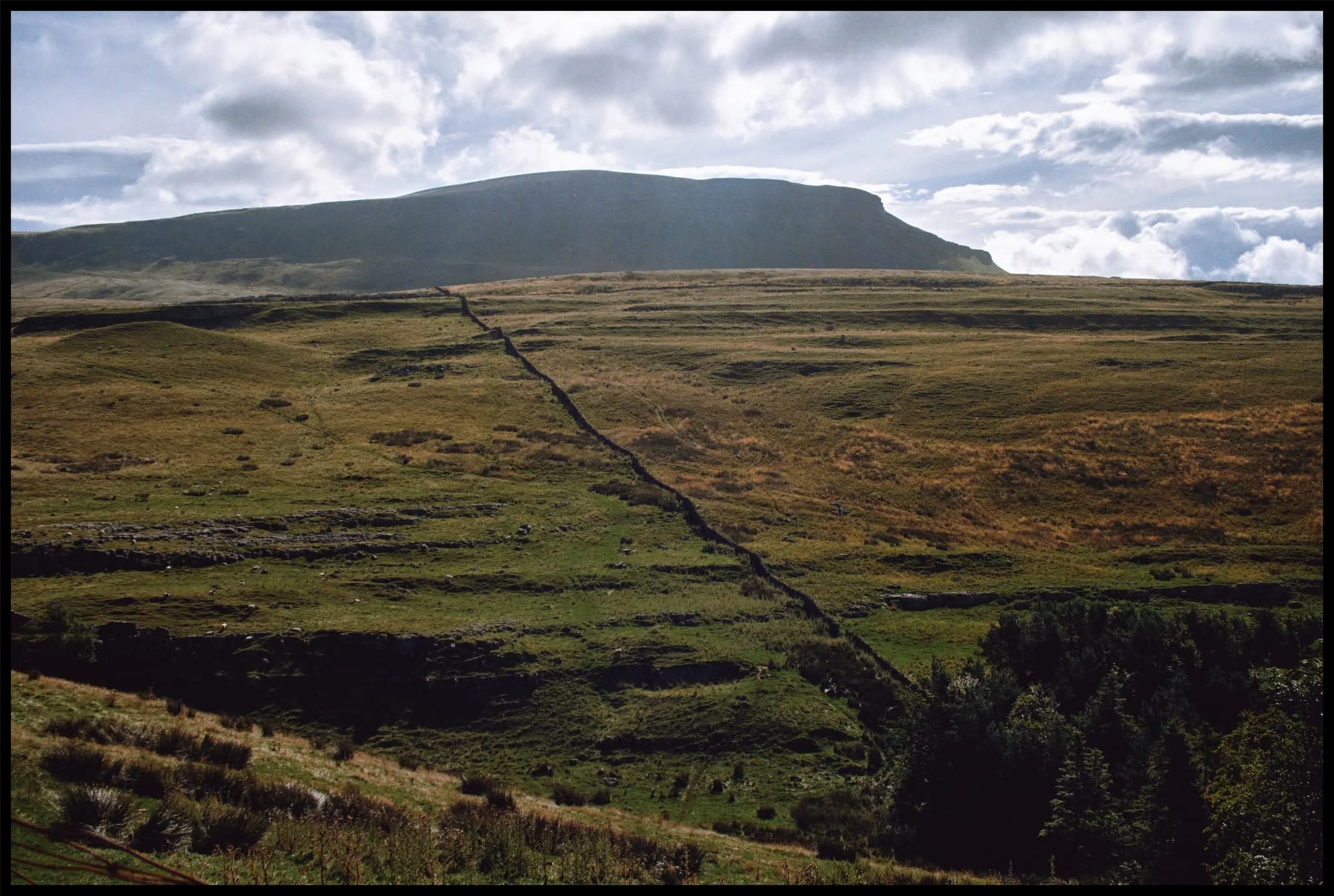  The western aspect of Pen-y-Ghent with its famous brow and &ldquo;nose&rdquo;. I enjoyed making this Z in the landscape using the drystone wall as it climbs up Horton Scar. 