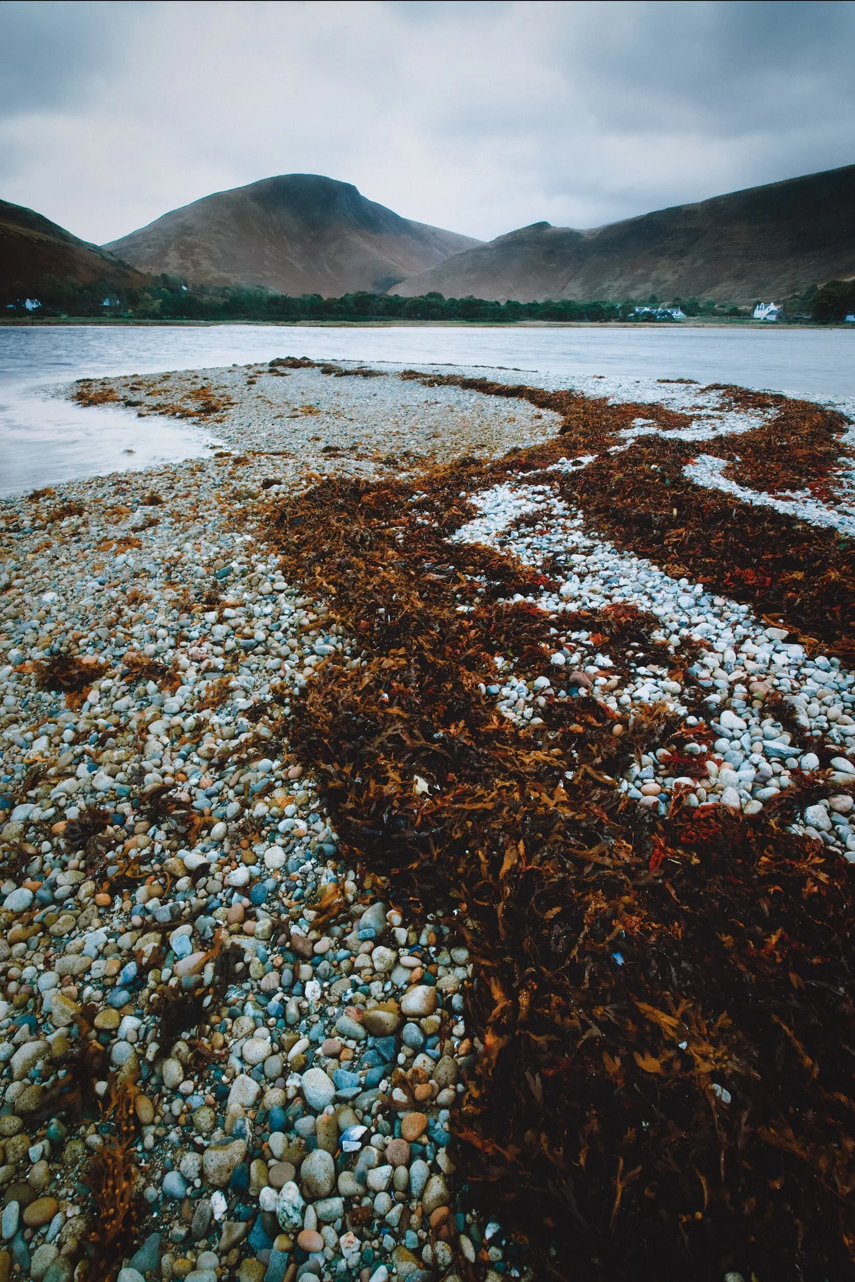  We did have to contend with a full day, maybe two, of non-stop rain. But we ventured whenever we could spot gaps in the downpour. This is a composition from the spit of land that protrudes into Loch Ranza, northwest Arran. The hill featured in the centre is  Tòrr Nead an Eoin  (325 m/1,066 ft, meaning &ldquo;crag of birds nests&rdquo;) 