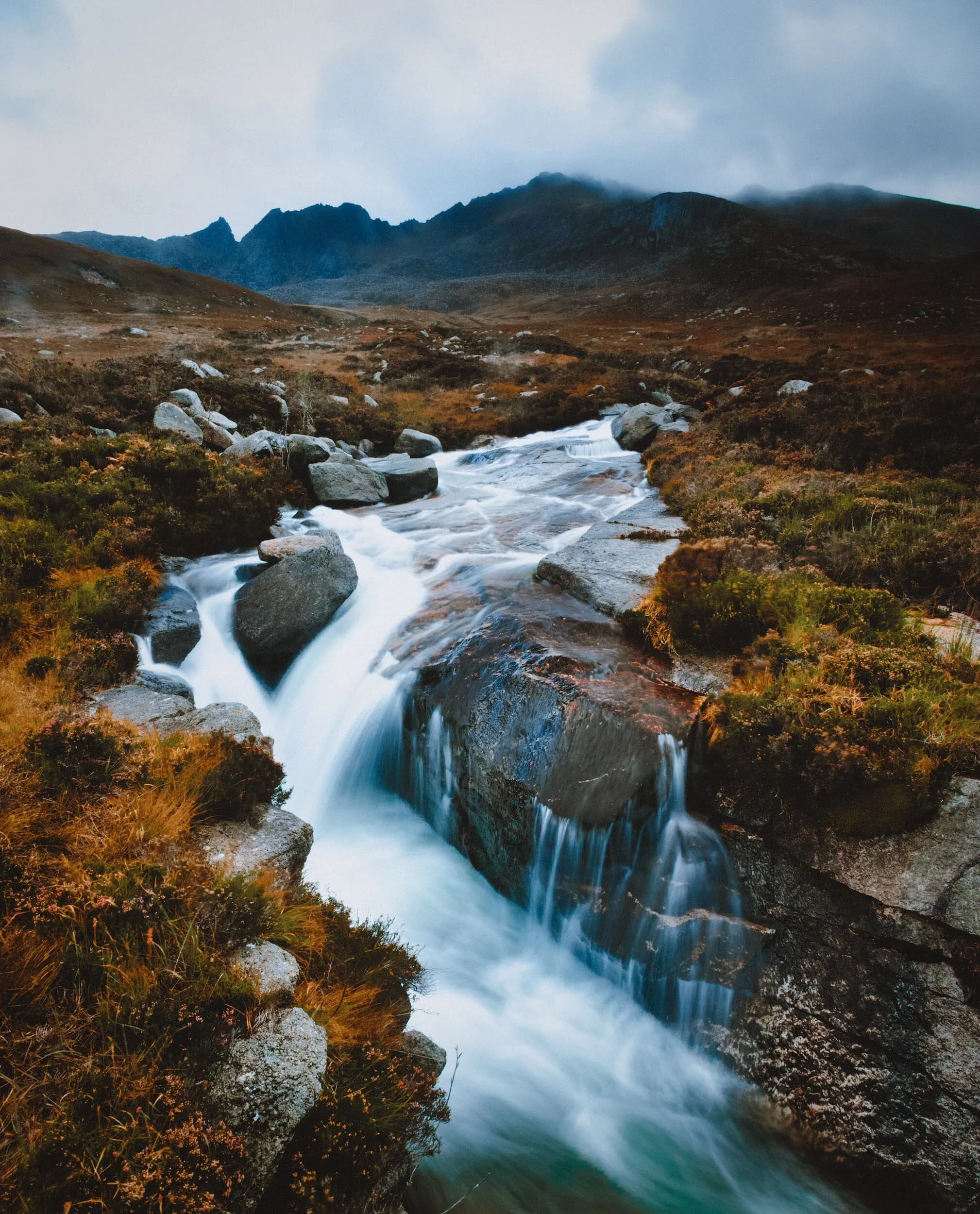  One of the finest compositions I managed to nail in my time on the island. This is North Glen Sannox, looking towards the back of  Cir Mhòr  and  Caisteal Abhail  (859 m/2,818 ft, meaning &ldquo;stronghold of the ptarmigan&rdquo;). Our hike up this valley was frequently interrupted by passing squalls, but it was so windy that we knew we just had to wait it out and the rain would quickly move on. 