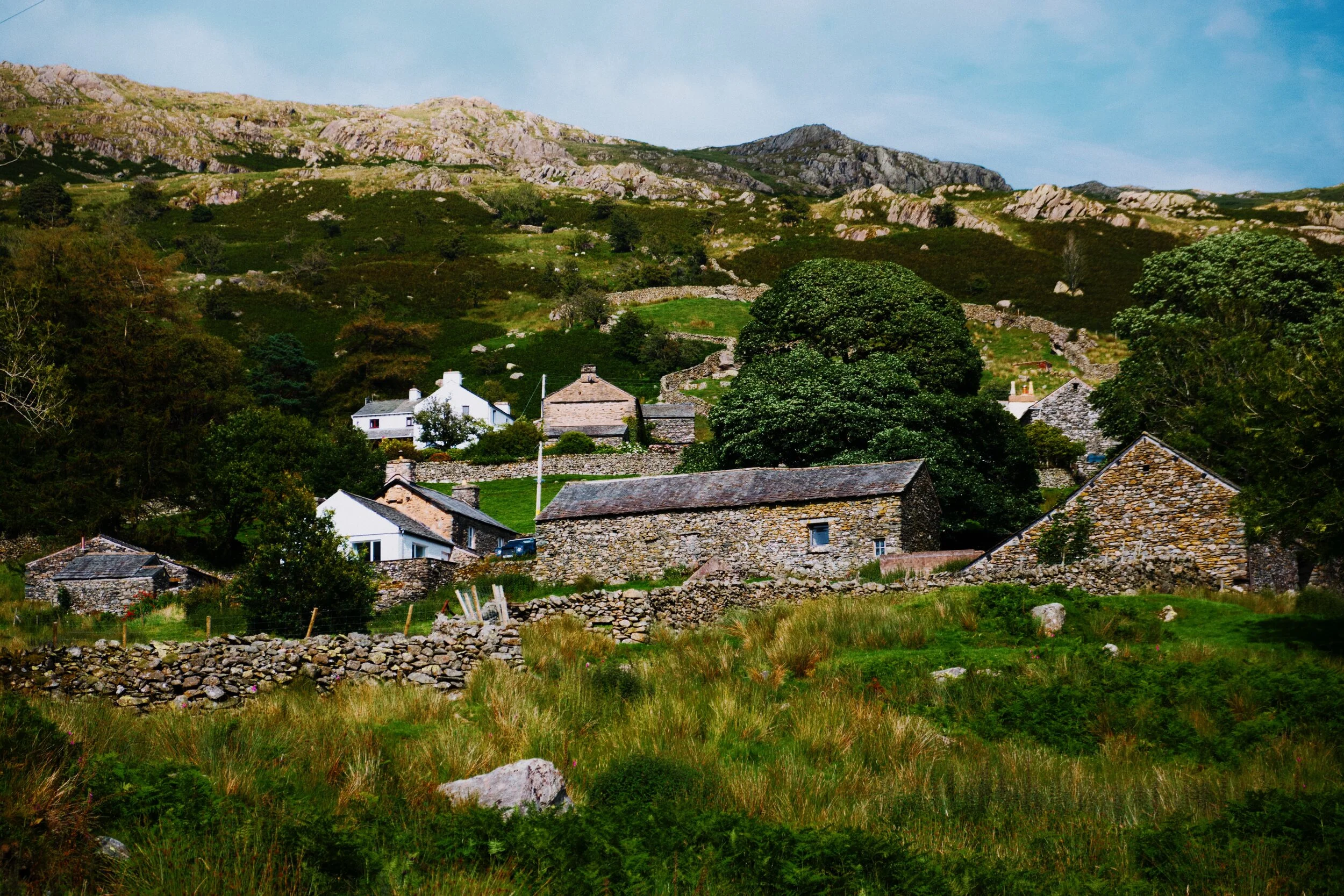 Admiring the wonderful barns and cottages dotted around Hallow Bank, looking up towards Shipman Knotts and Wray Crag.