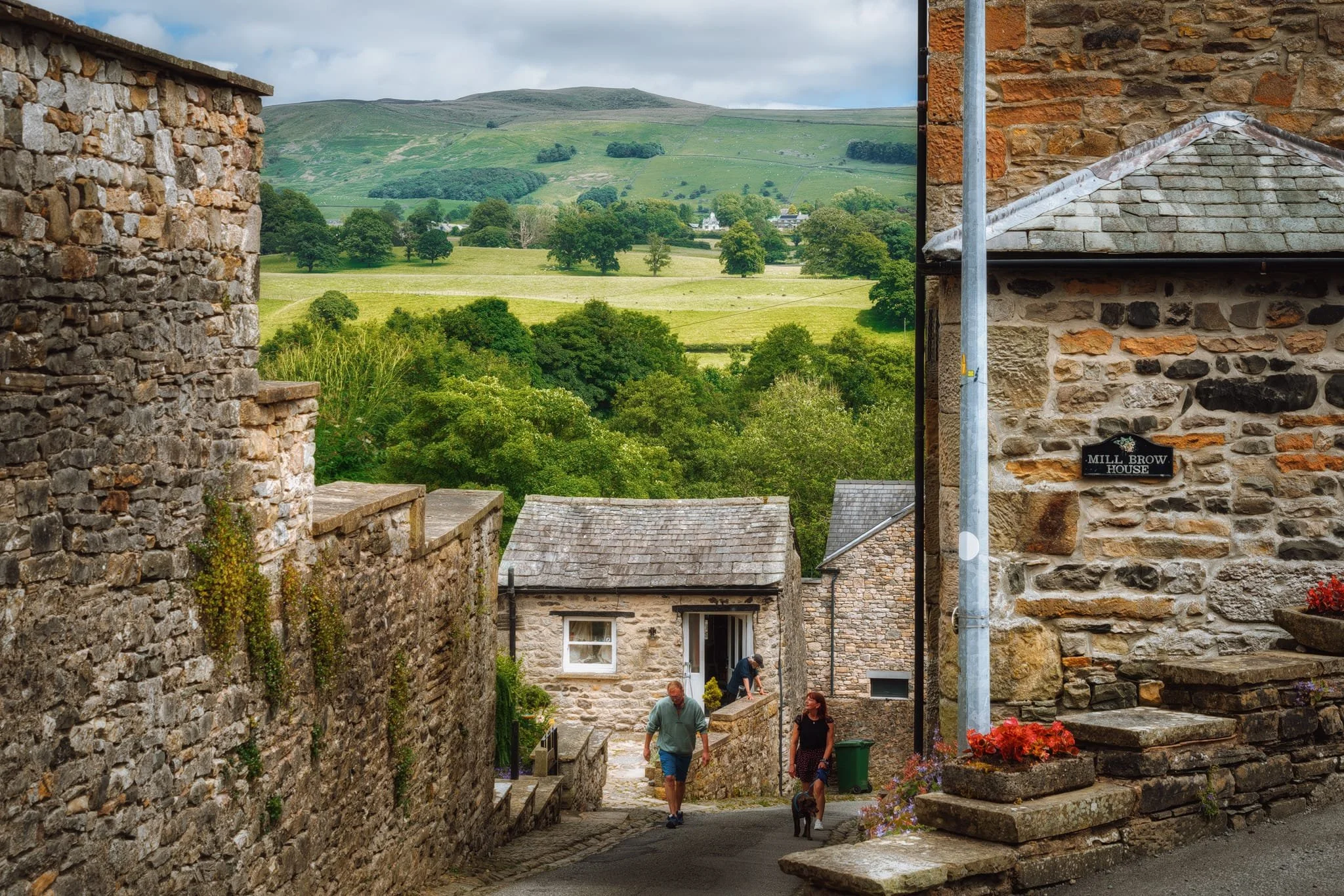  Looking down Mill Brow as it steepens, another wonderful view opens up towards Gragareth (627 m / 2,057 ft). Historically this fell formed the boundary between the West Riding of Yorkshire and Westmorland; there&rsquo;s still a drystone wall up there that follows the old county boundary.  