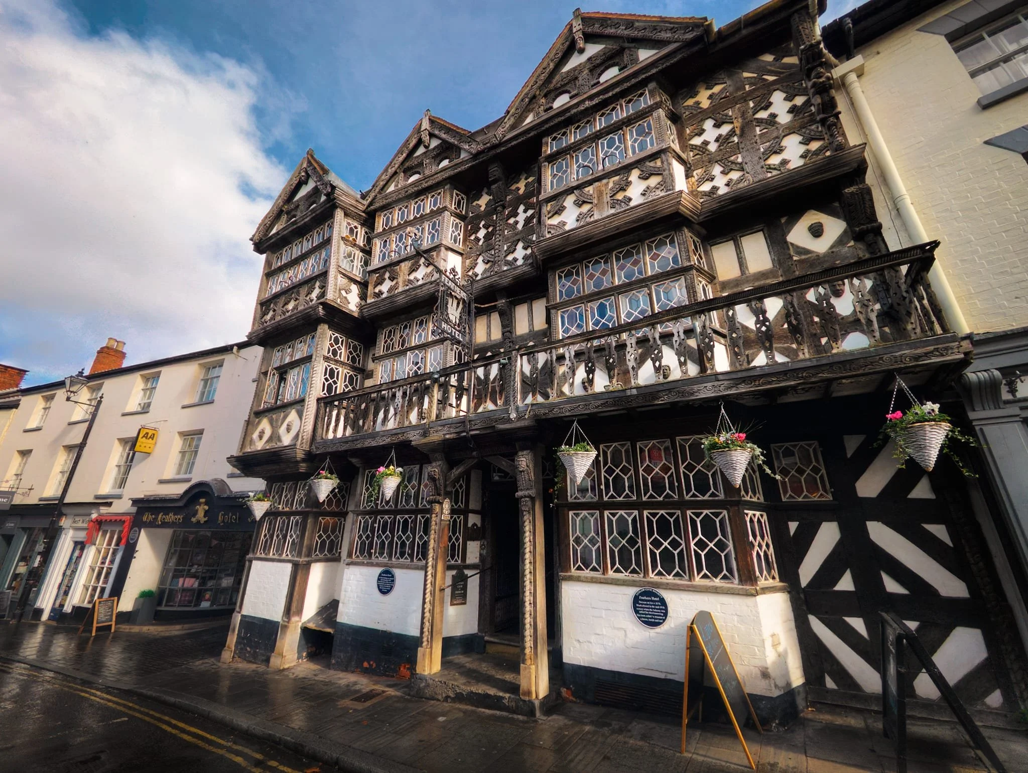  This is one of Ludlow&rsquo;s more famous buildings,  the Feathers Hotel . It was built in 1619 CE for an attorney from Pembrokeshire. Apparently upon conversion to a hotel none of this older features of this building was touched. It is still in use as a hotel; we went inside for lunch and its every bit as cosy as you could imagine. 