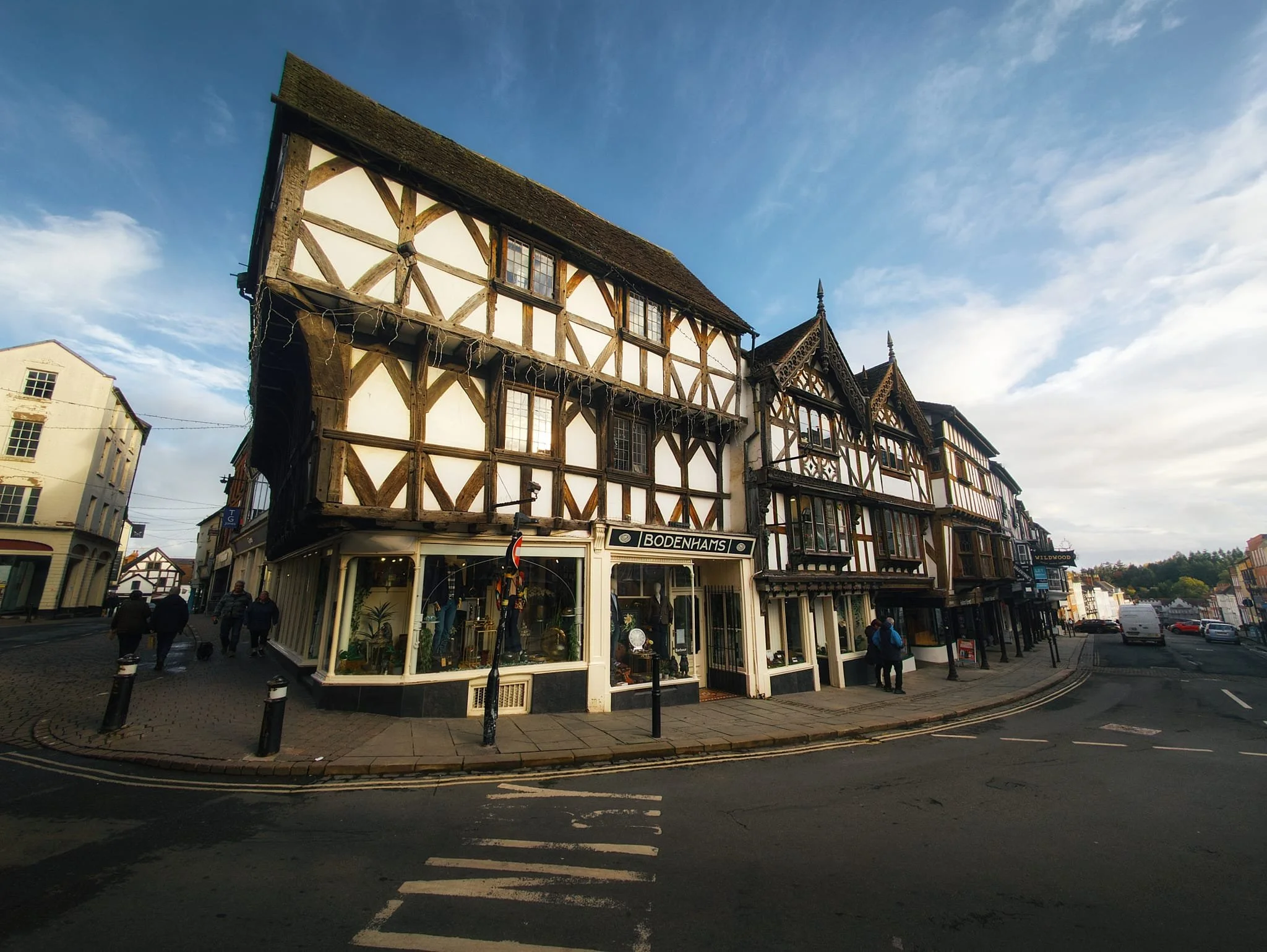  At the junction of Broad Street with High Street and Church Street, an ultra-wide composition reveals the wider context of Broad Street&rsquo;s beautiful buildings, a lot of which are still in use.  