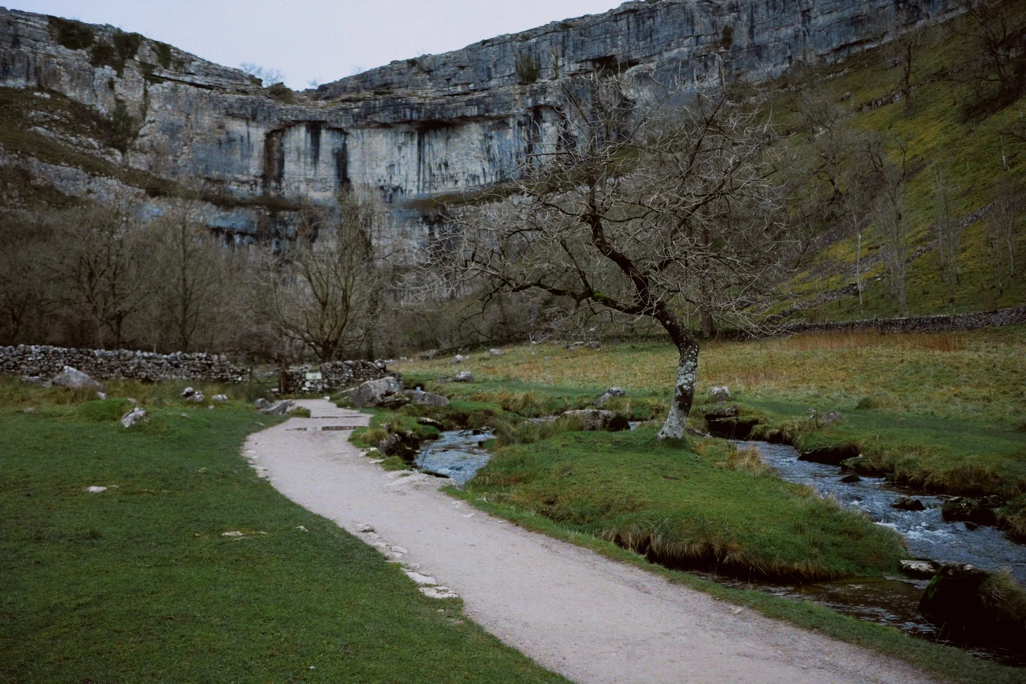 We’re fast approaching Malham Cove and the scale of this sheer limestone wall quickly makes itself apparent.