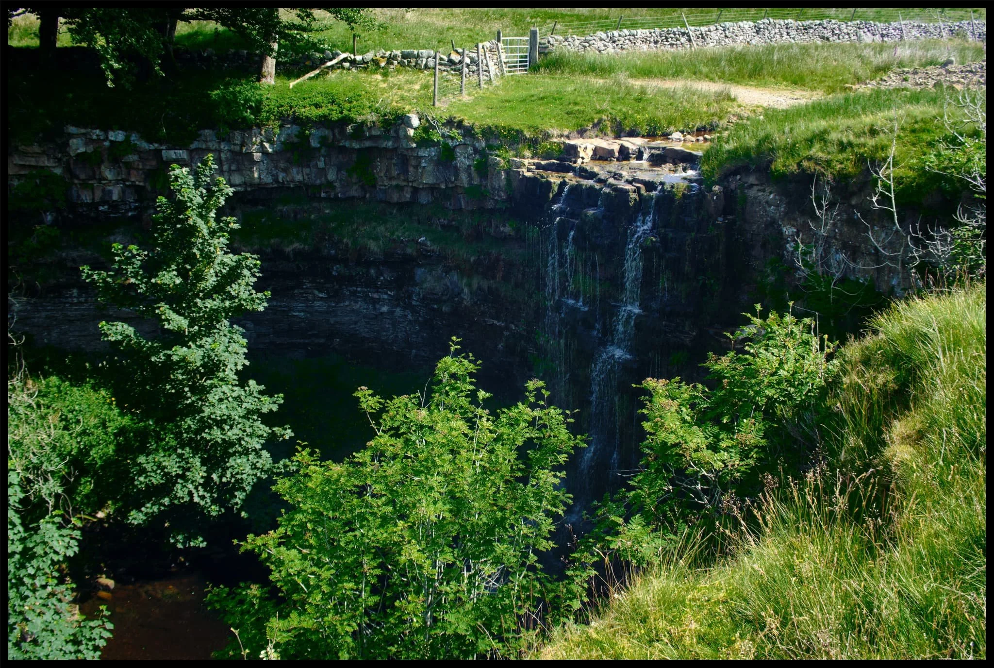  Our goal on this hike around Mallerstang was to get onto the Pennine Bridleway and eventually towards the Water Cut sculpture. Along the way, we diverted to get a view of Hell Gill Force, which with the lack of rain looked rather pitiful. 