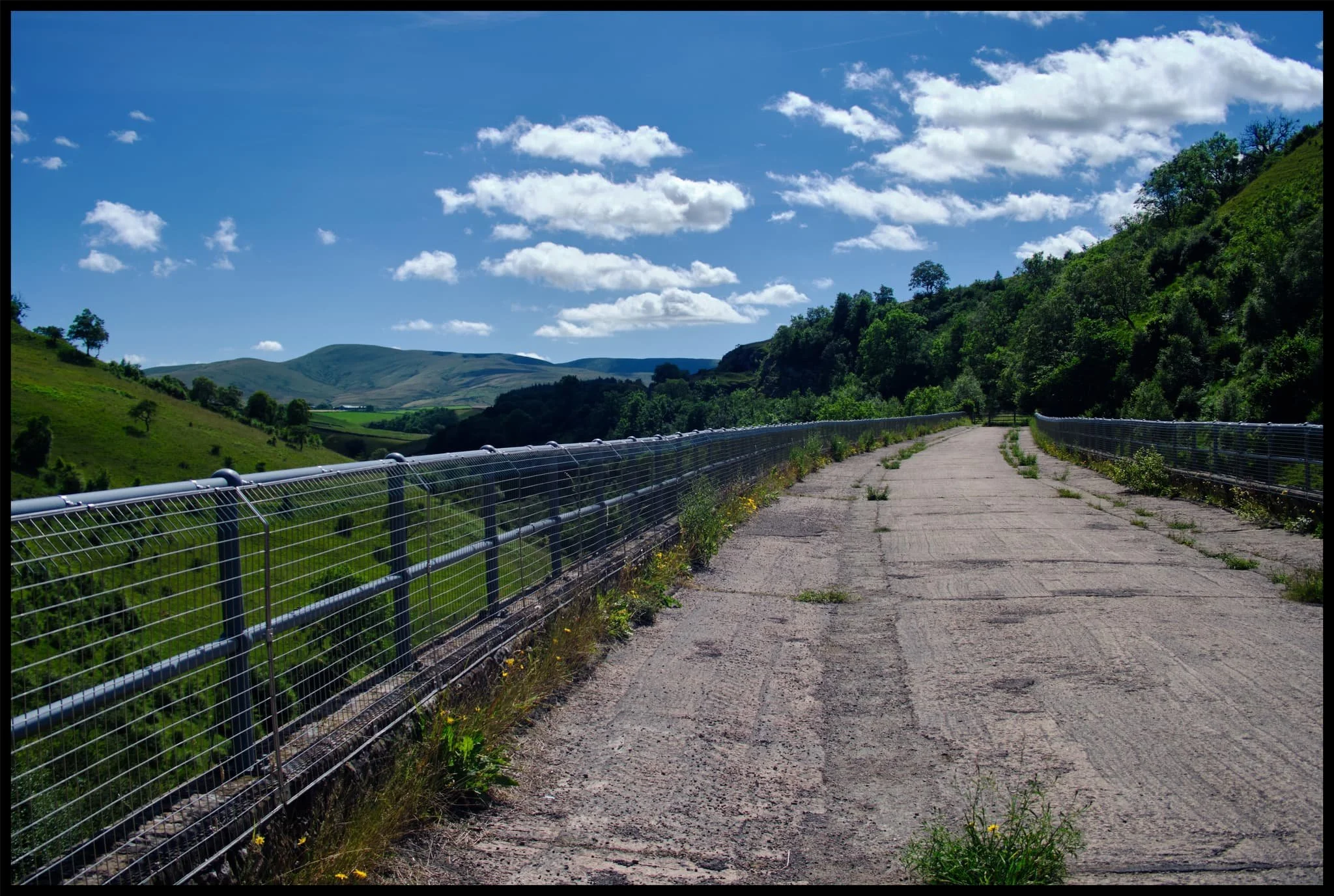  Smardale Gill Viaduct was built in 1861, crossing the Pennines to carry coke to the iron and steel furnaces in the Barrow area and West Cumberland. It carried the railway 90 feet (27m) high above the valley and was constructed of locally quarried sandstone. The viaduct has 14 arches of 30 feet span, and a total length of 553 feet (c170m). 