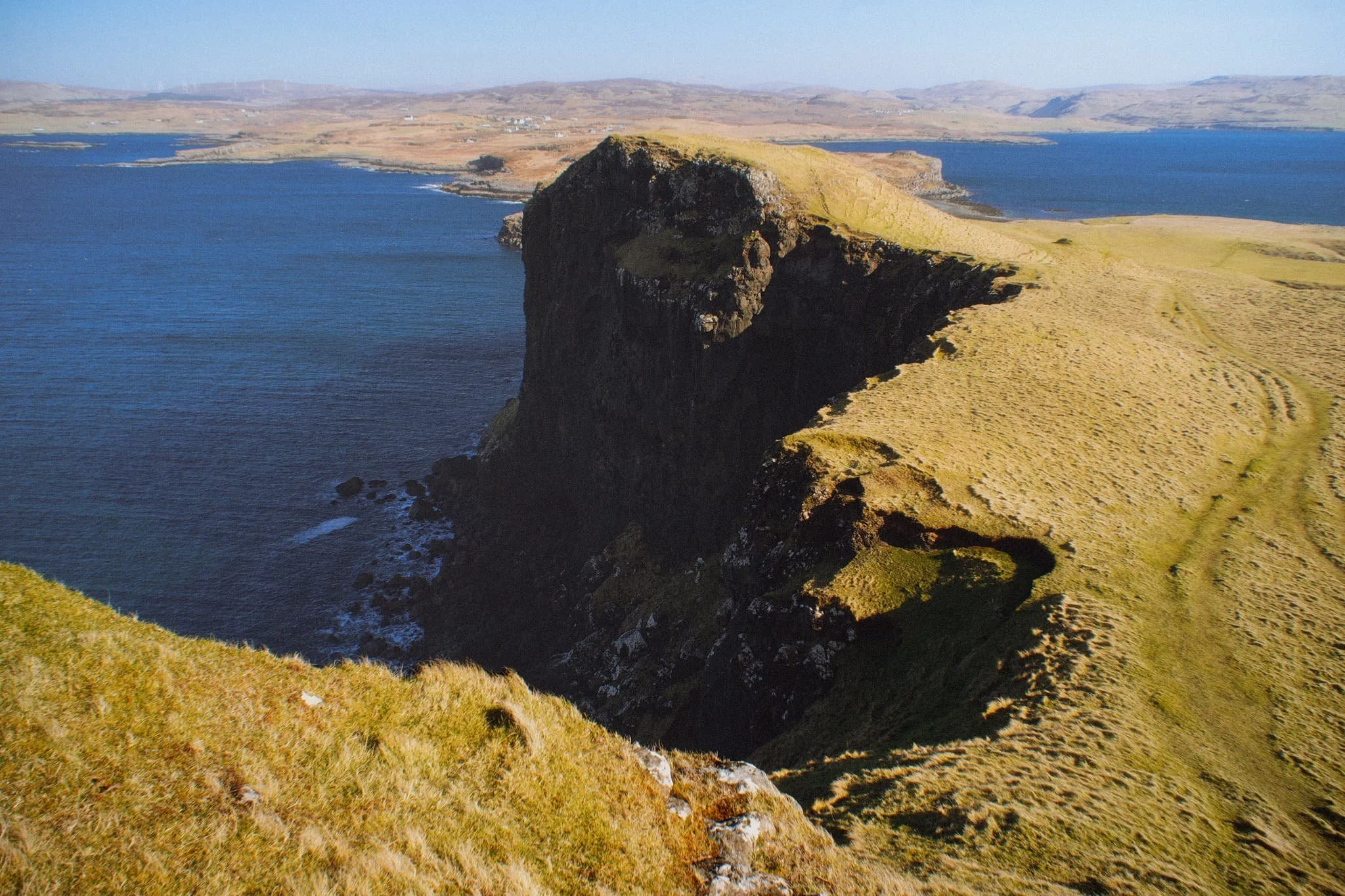  From Oronsay&rsquo;s tallest cliff, the view northeast down the island and across the loch all the way to Skye proper is just stunning. 
