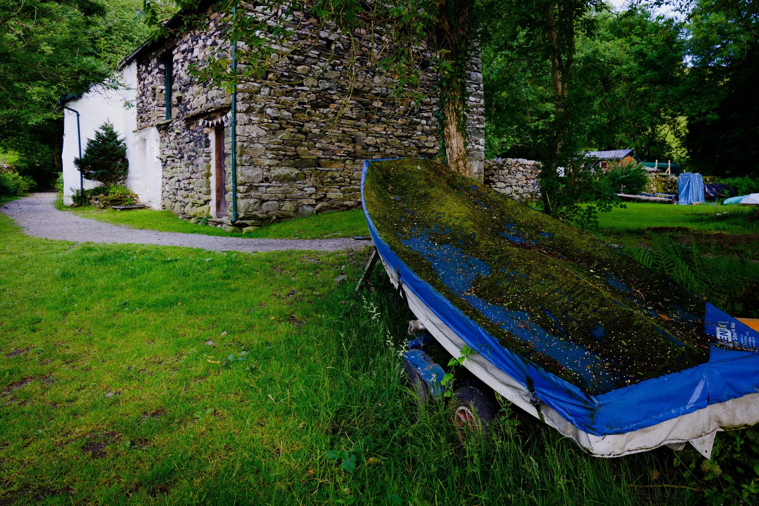 Not a bad little cottage to have, right near the shore of Windermere.