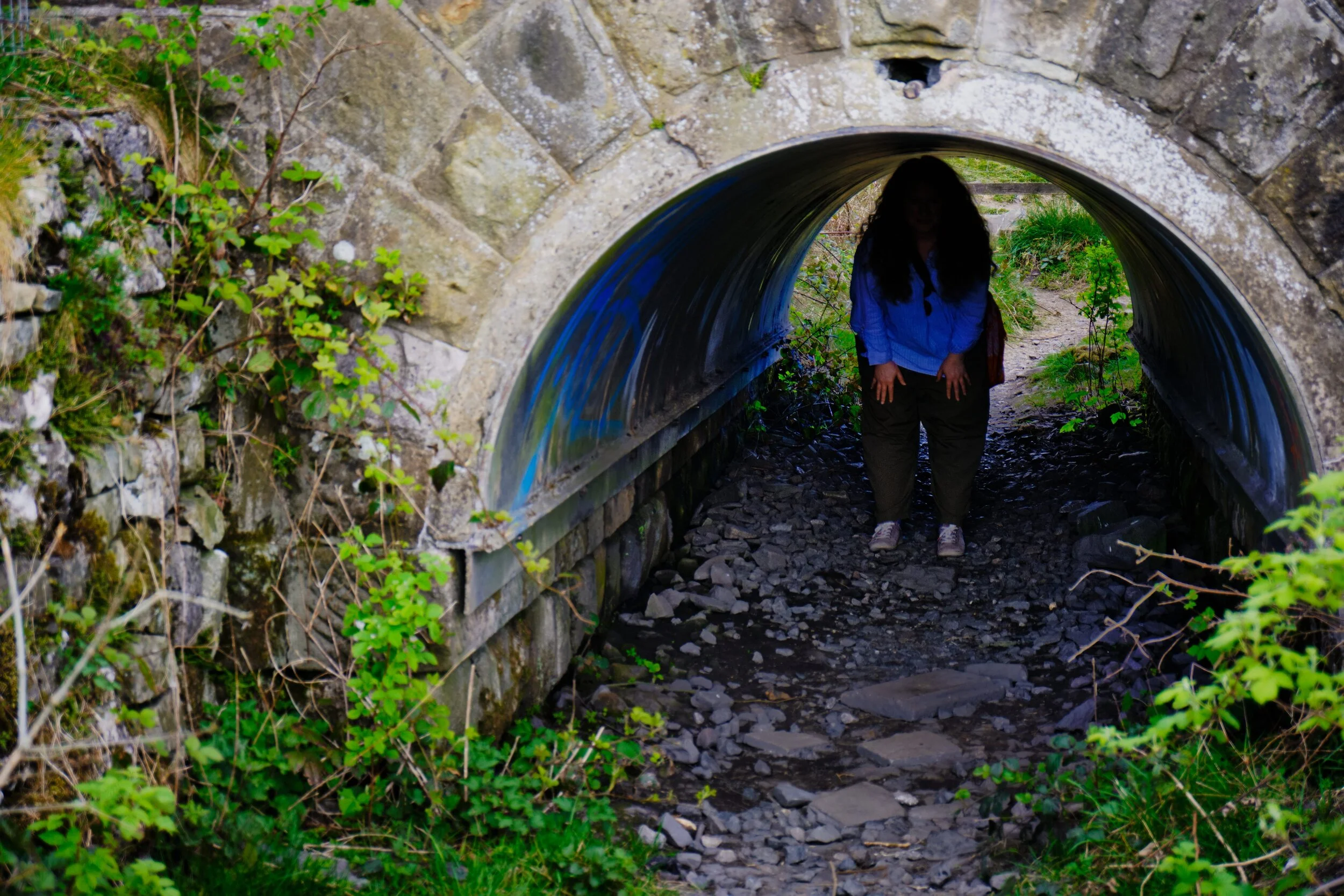 This is the pedestrian tunnel that crosses underneath the railway line. My lovely Lisabet here, demonstrating how low it is (she’s around 5ft 3in and had to hunch over).