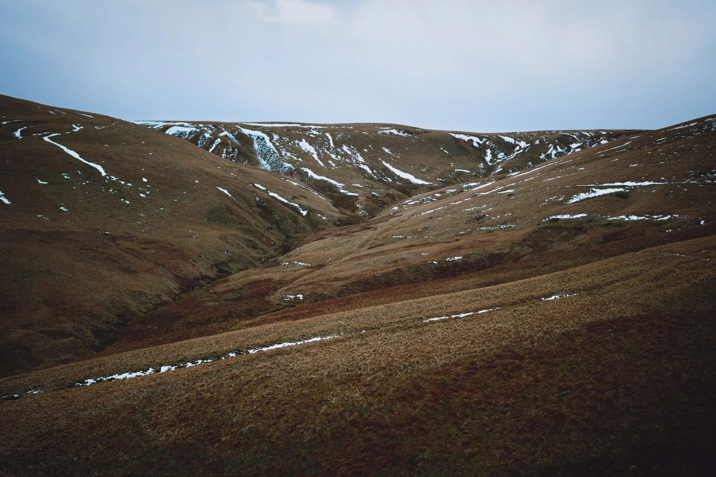 The head of the Carrock Beck valley, which summits at High Pike. Still a bit of snow around.