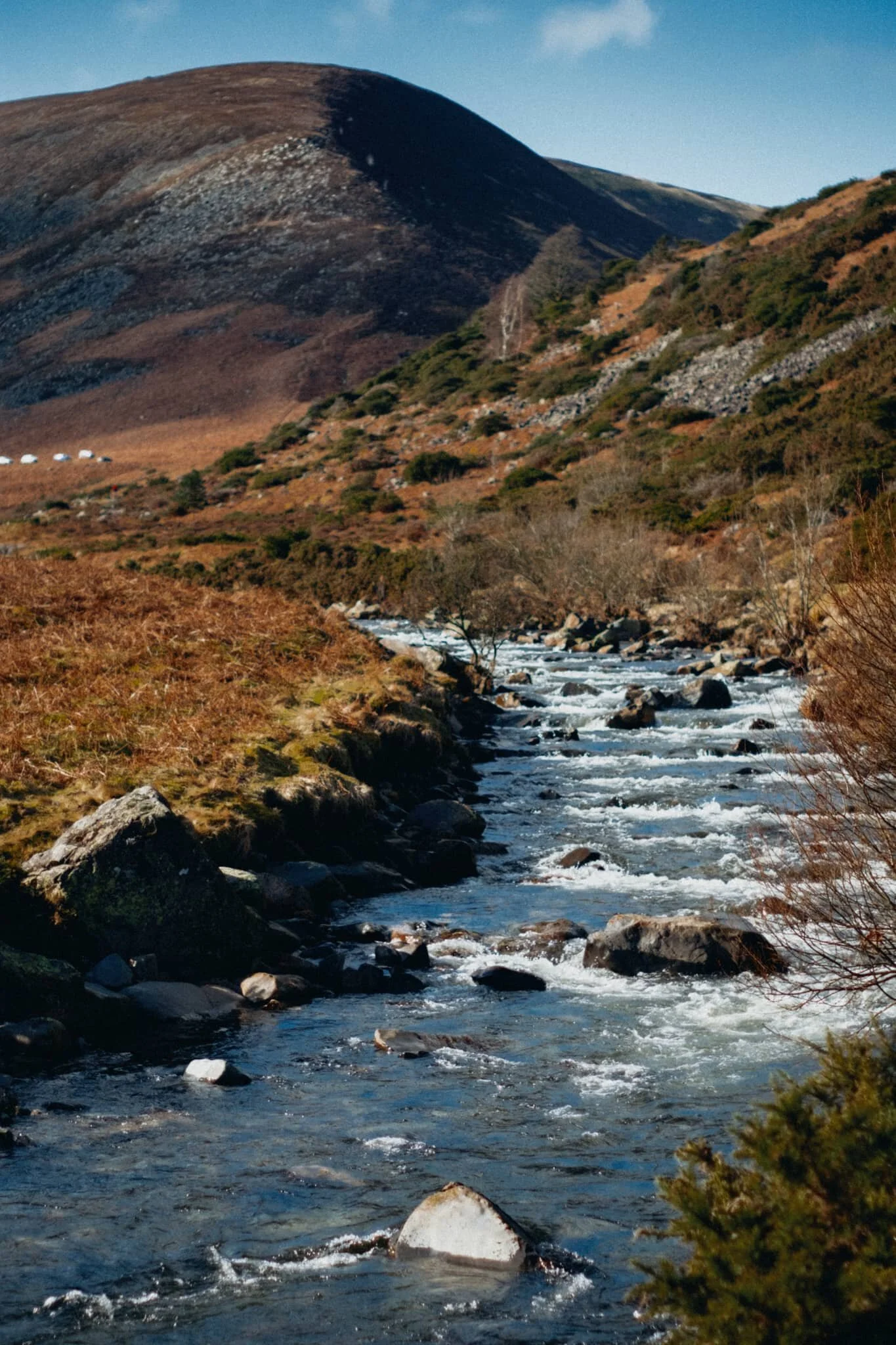  As the valley pinches tighter the track runs right alongside the river, allowing for compositions straight down the cascades towards Coomb Height. 