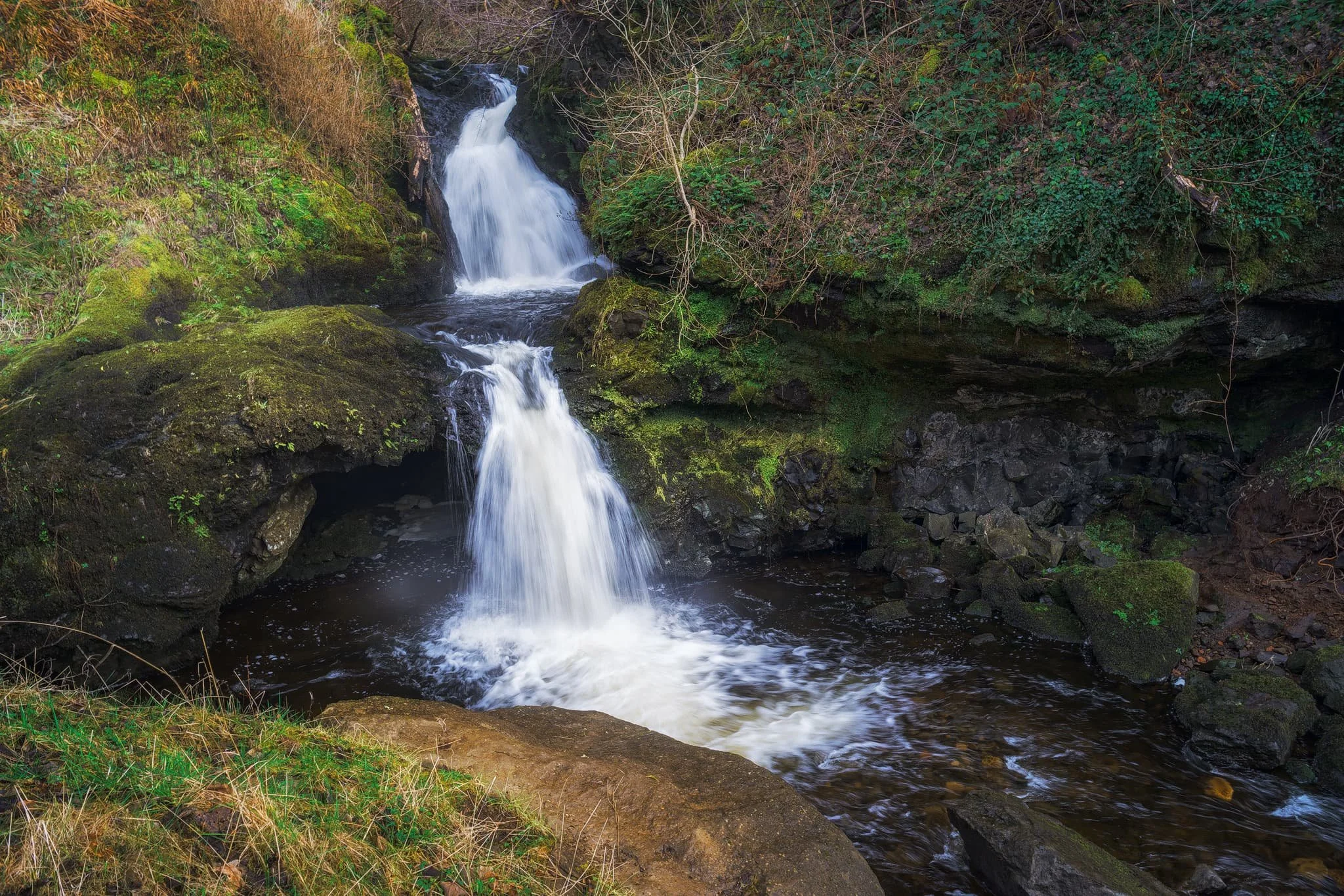  On the trail, the sound of rushing water caught our attention. We quickly nipped off trail and followed the sound, locating this beautiful and totally unexpected waterfall! These unnamed falls belong to the River Chracaig as it tumbles down the hills above. 