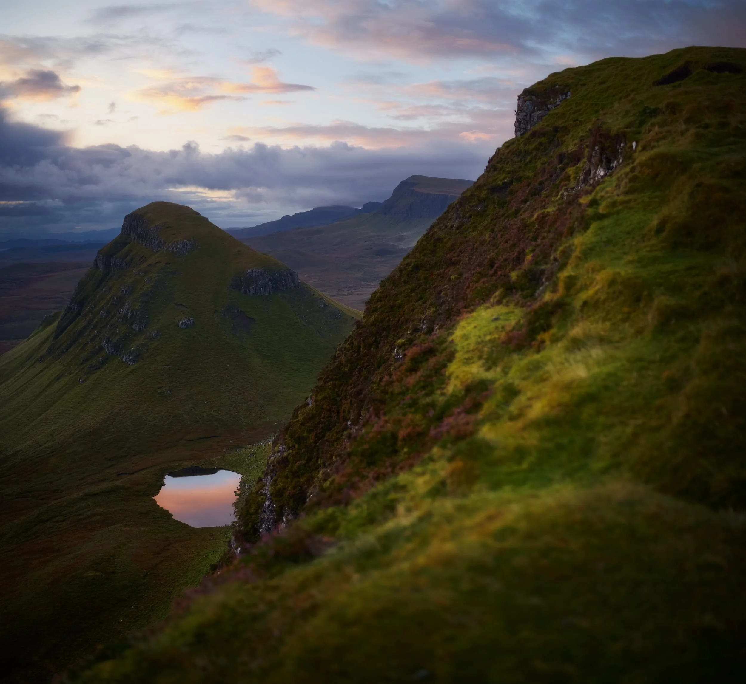  As dawn breaks the sunrise light show gets better and better. This image is made of 6 landscape photos shot on a 35mm/f1.2 lens, stacked top to bottom and merged into a &ldquo;bokehrama&rdquo;. The hill on the left is called  Cleat  (336 m/1,102 ft). 
