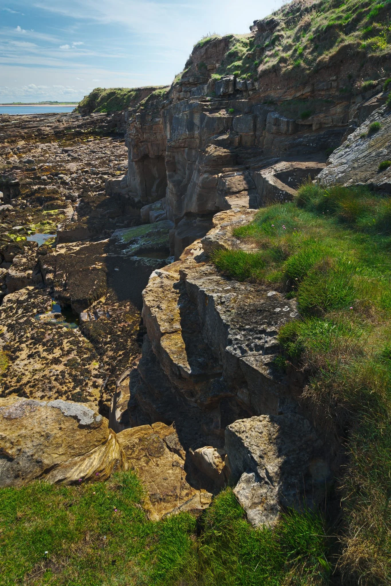  Looking south, some actual cliffs in Northumberland. We will definitely need to come back when both the light isn&rsquo;t as harsh and when the tide is in. I think this area will look even better when filled with water. 