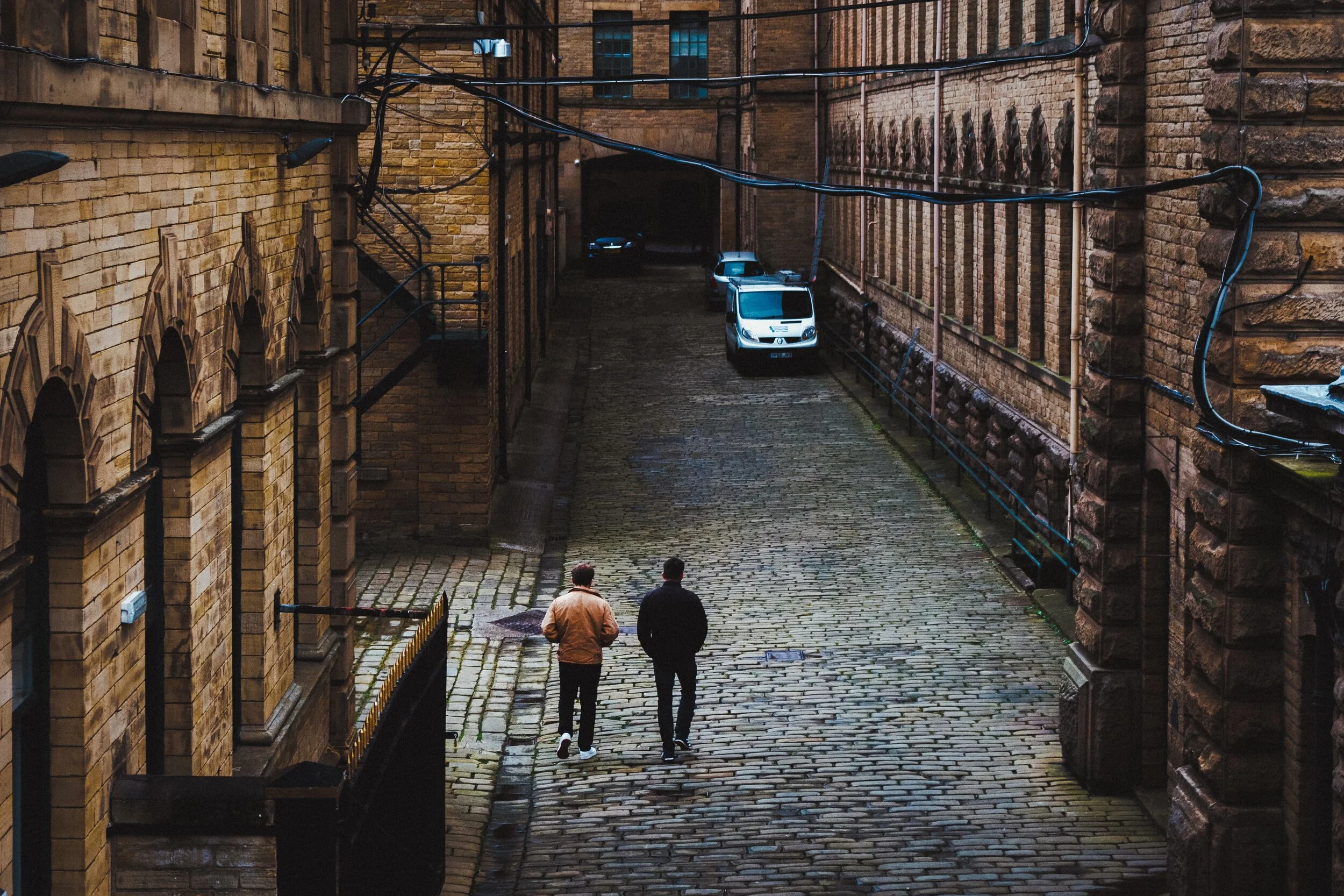 Looking back down the yard from the railway bridge. I was attempting my own modern-day version of an old photo I saw displayed inside the mill, which depicted hundreds of workers finishing their shift and walking down this yard; a veritable sea of people. The quote attached to that photo was something like, “If you were last leaving the building, you may as well turn back and spend the night in the mill.”
