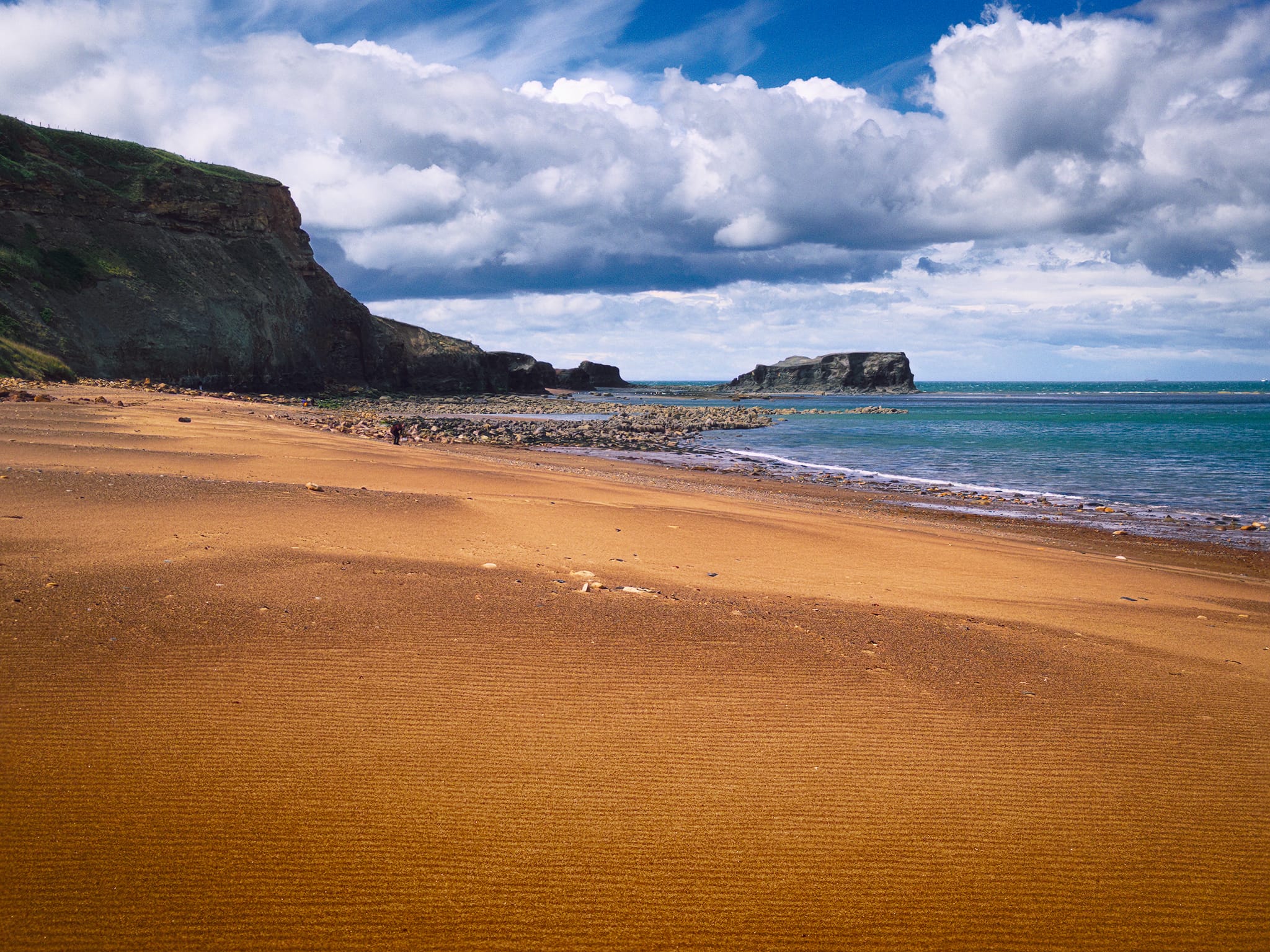 From the southeastern cliffs, looking back across the bay towards the northeastern cliffs and the distinctive Saltwick Nab.