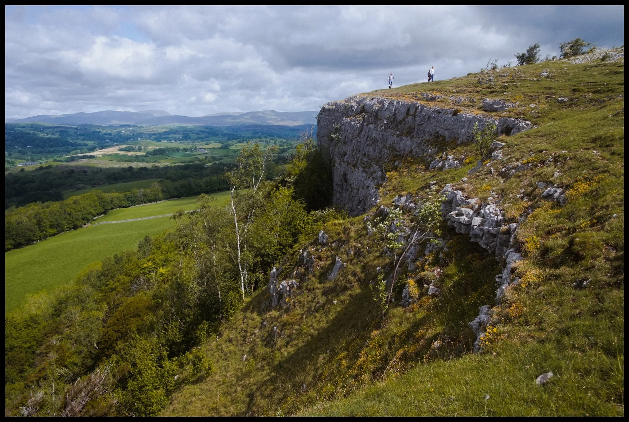  I think this is one of the bigger vertical drops along Scout Scar, highlighted by the tiny people waltzing along the top. 
