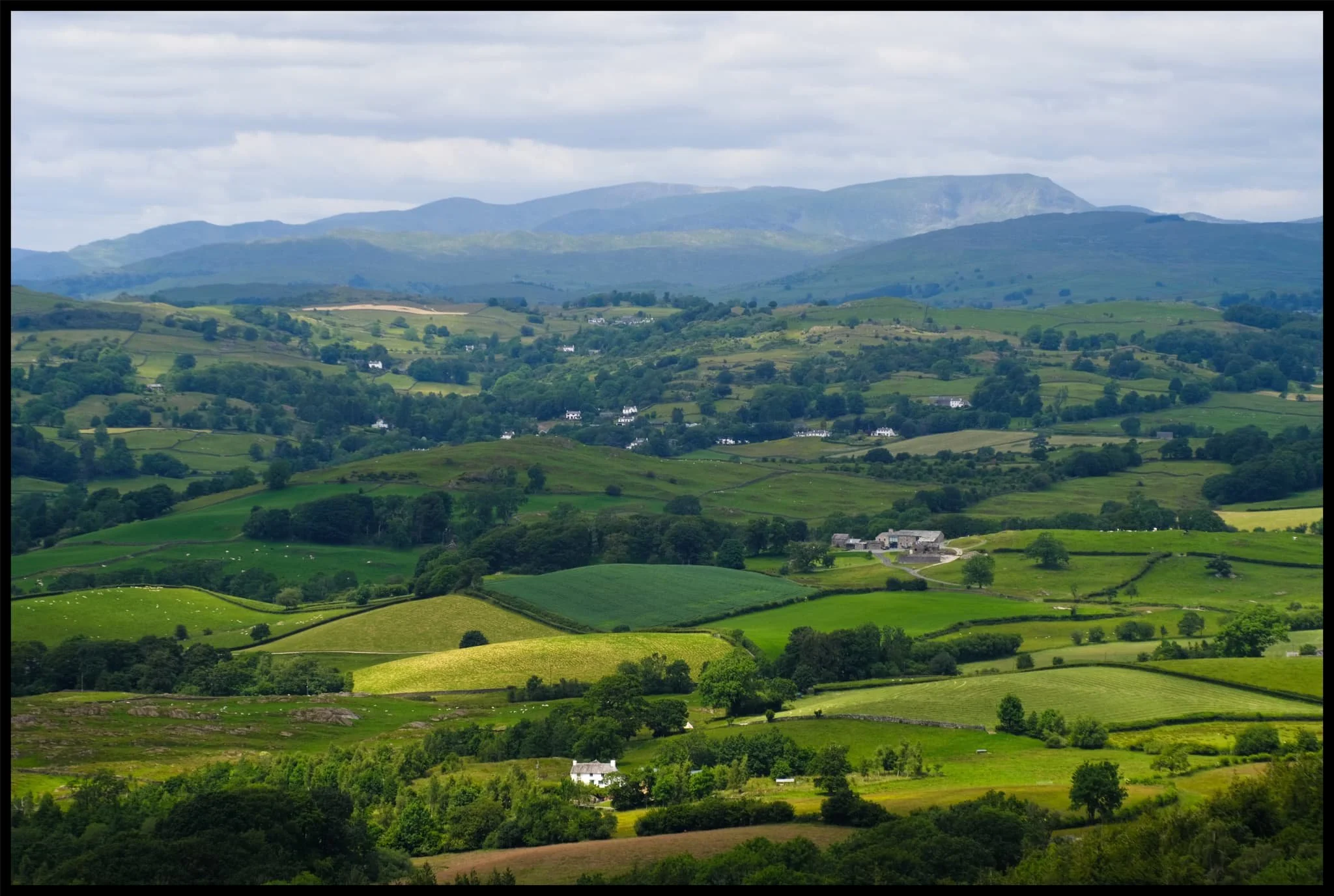 The Coniston fells catch the scanning rays of the sun like the Lyth Valley below. 