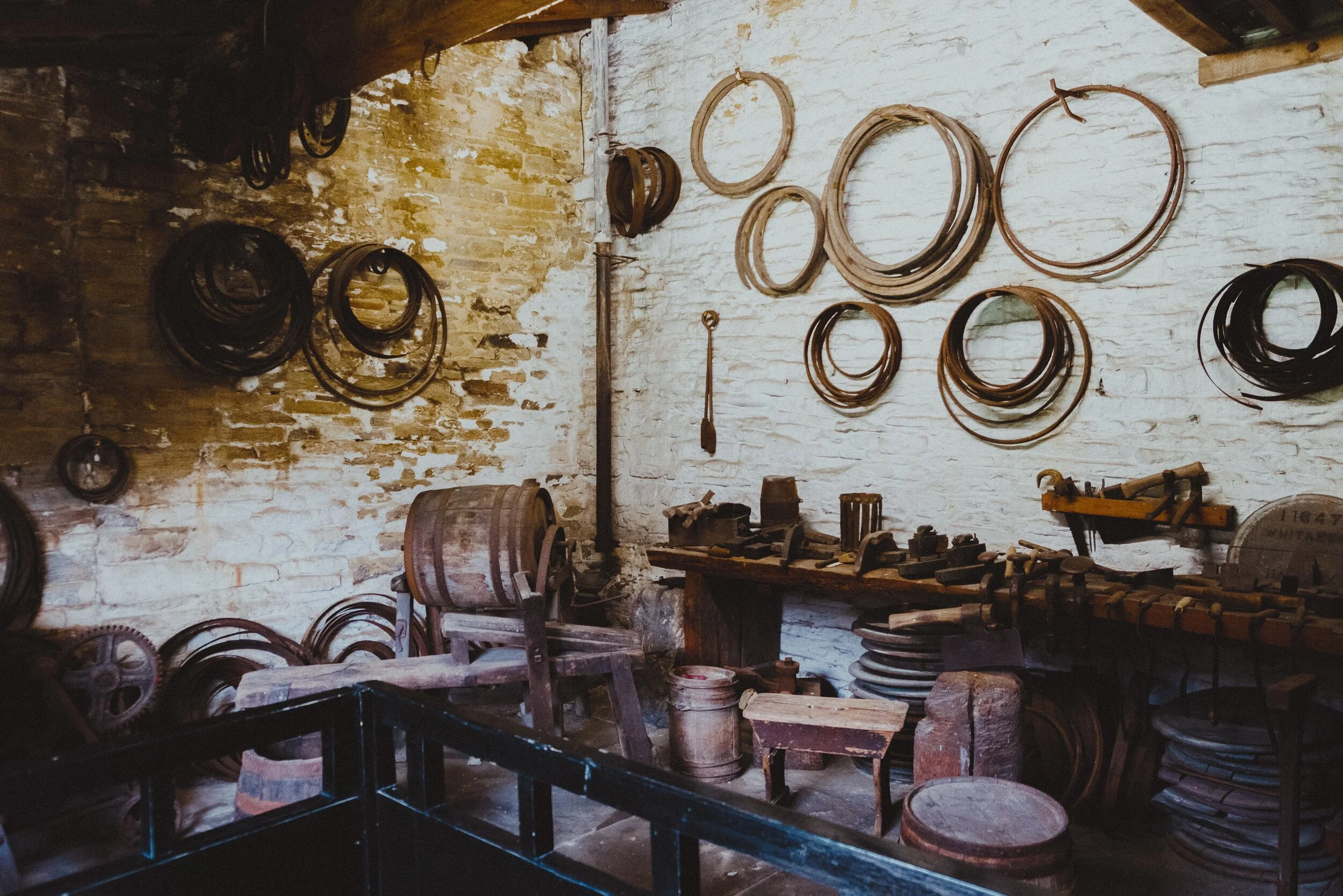 The Cooper’s workshop. A cooper is a person trained to “make wooden casks, barrels, vats, buckets, tubs, troughs and other containers”.