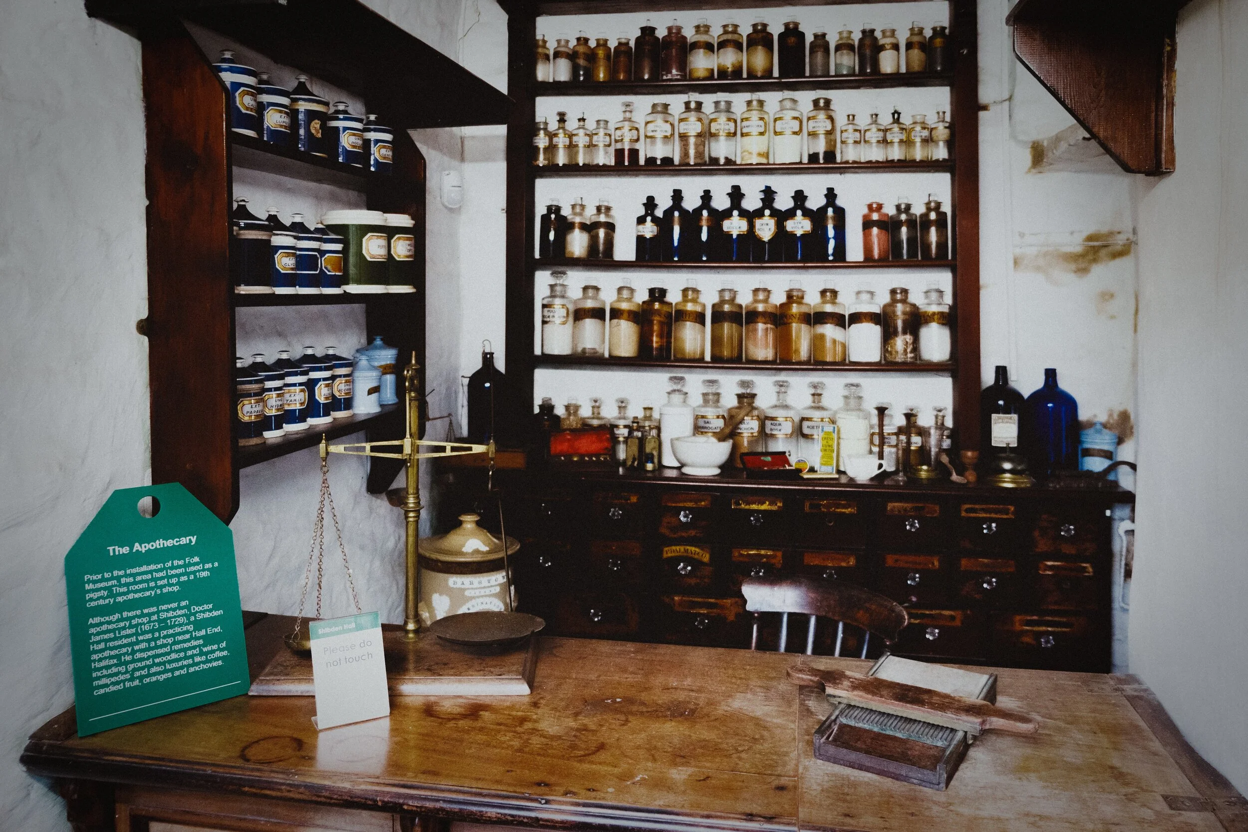 The Apothecary. These days you would call them a Pharmacy (or we tend to say a “Chemist’s” in modern Britain).