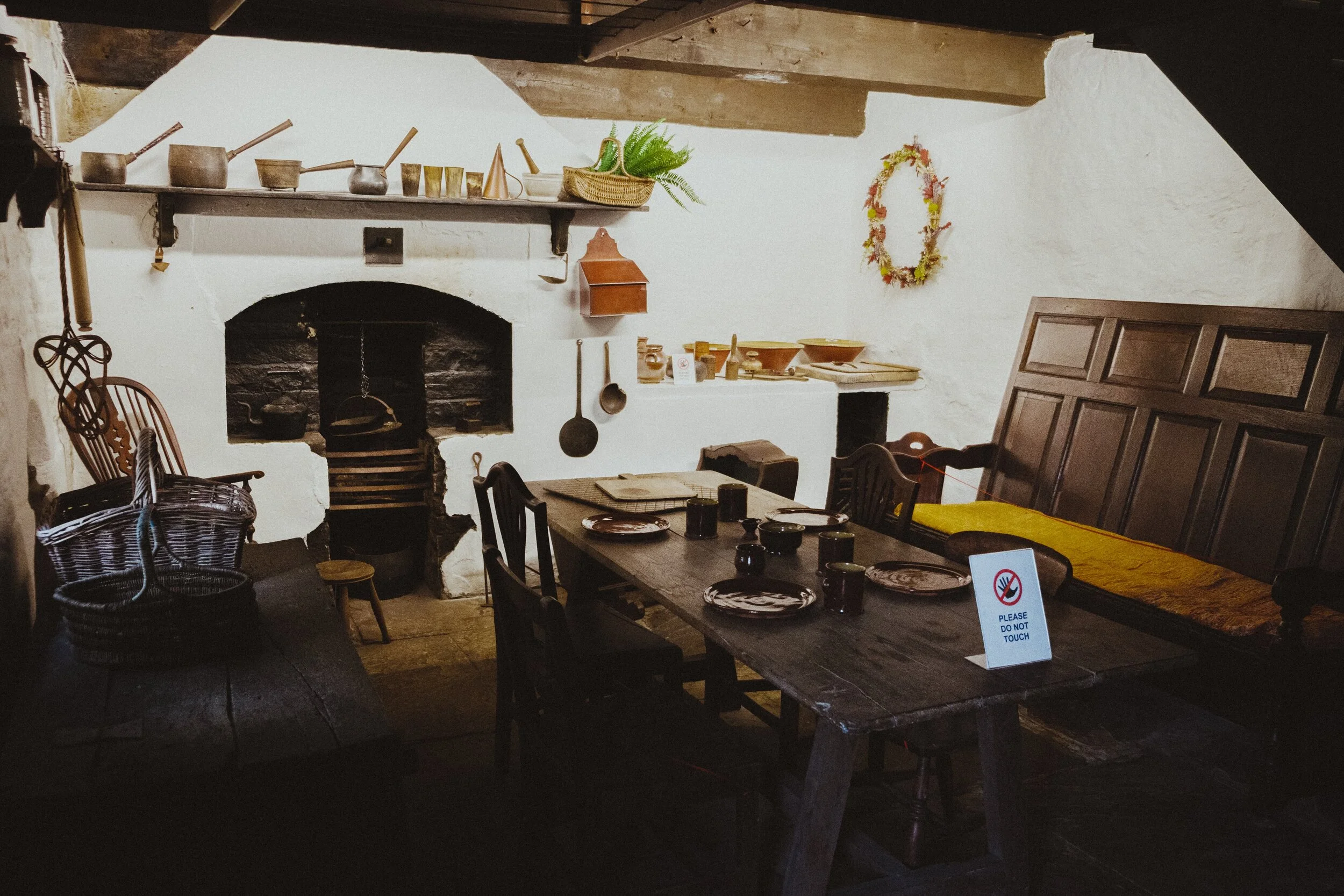 This is an example of a Victorian Estate Worker’s cottage. Literally one-up/one-down, these two rooms would house large working families of 7–10 people.