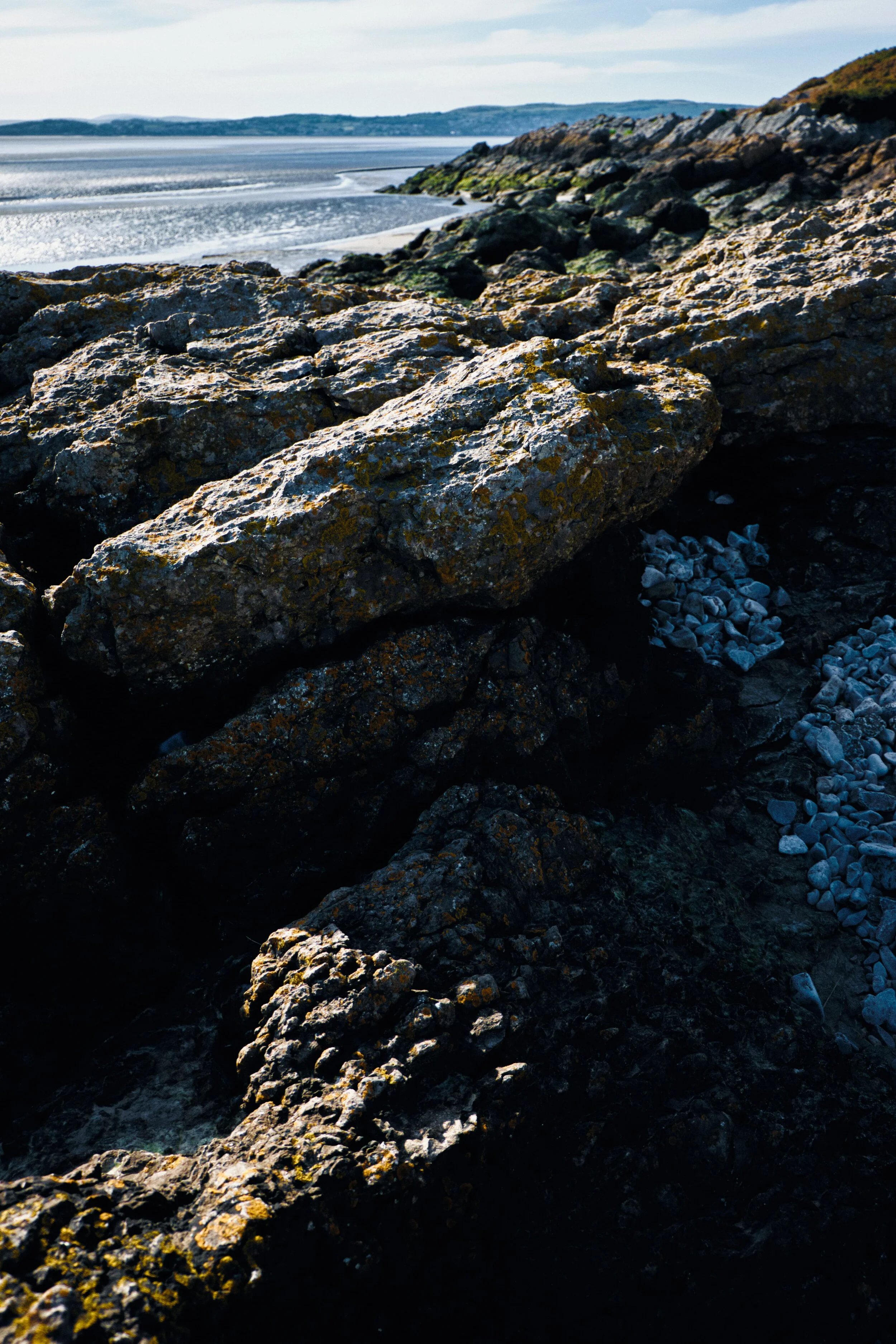 Looking northwards across Morecambe Bay from the limestone cove towards Grange-over-Sands and the Cumbrian coast.