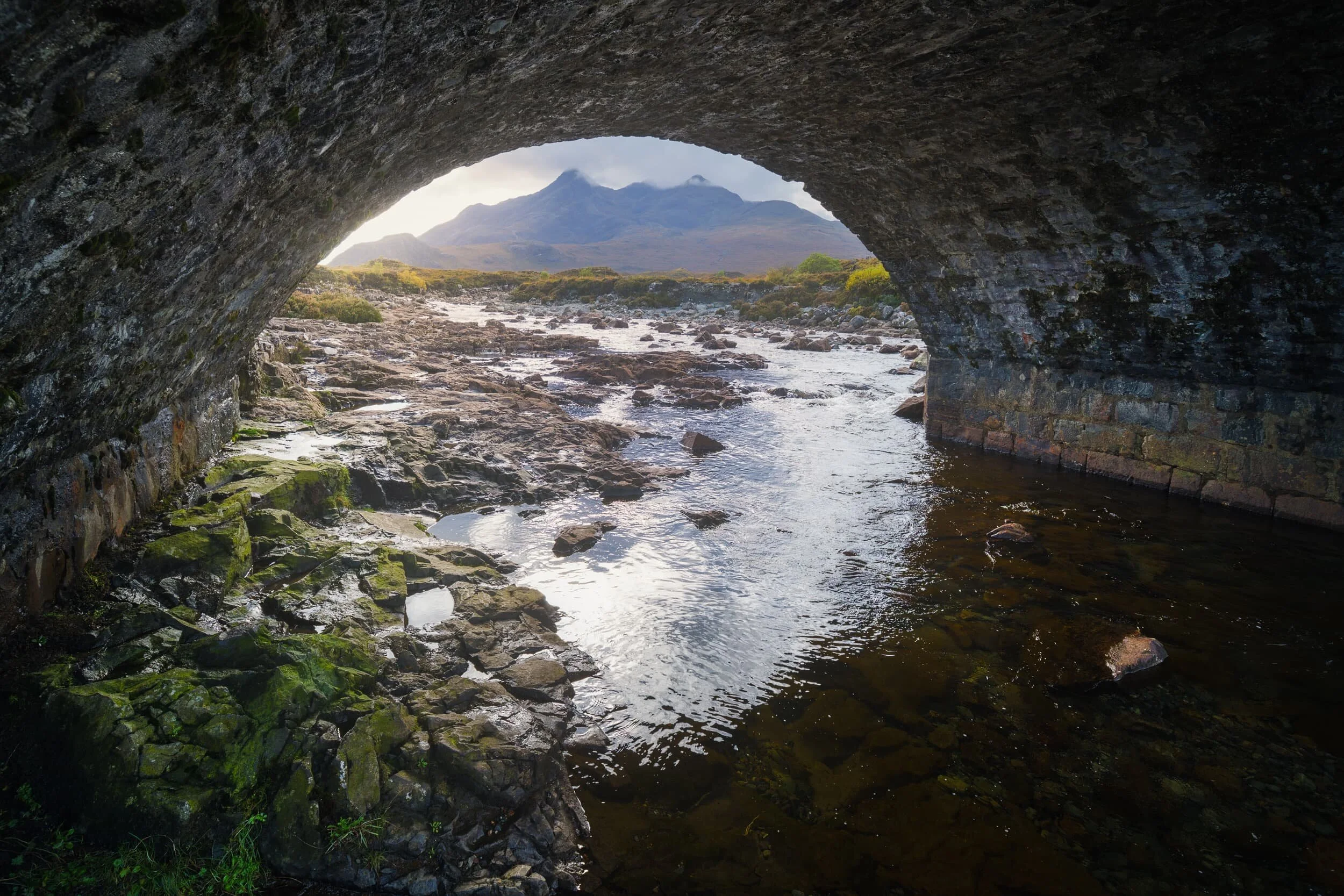 If the river’s particularly low it’s possible to clamber underneath the arches of the Old Sligachan Bridge. This can lead to interesting compositions involving the Black Cuillins.