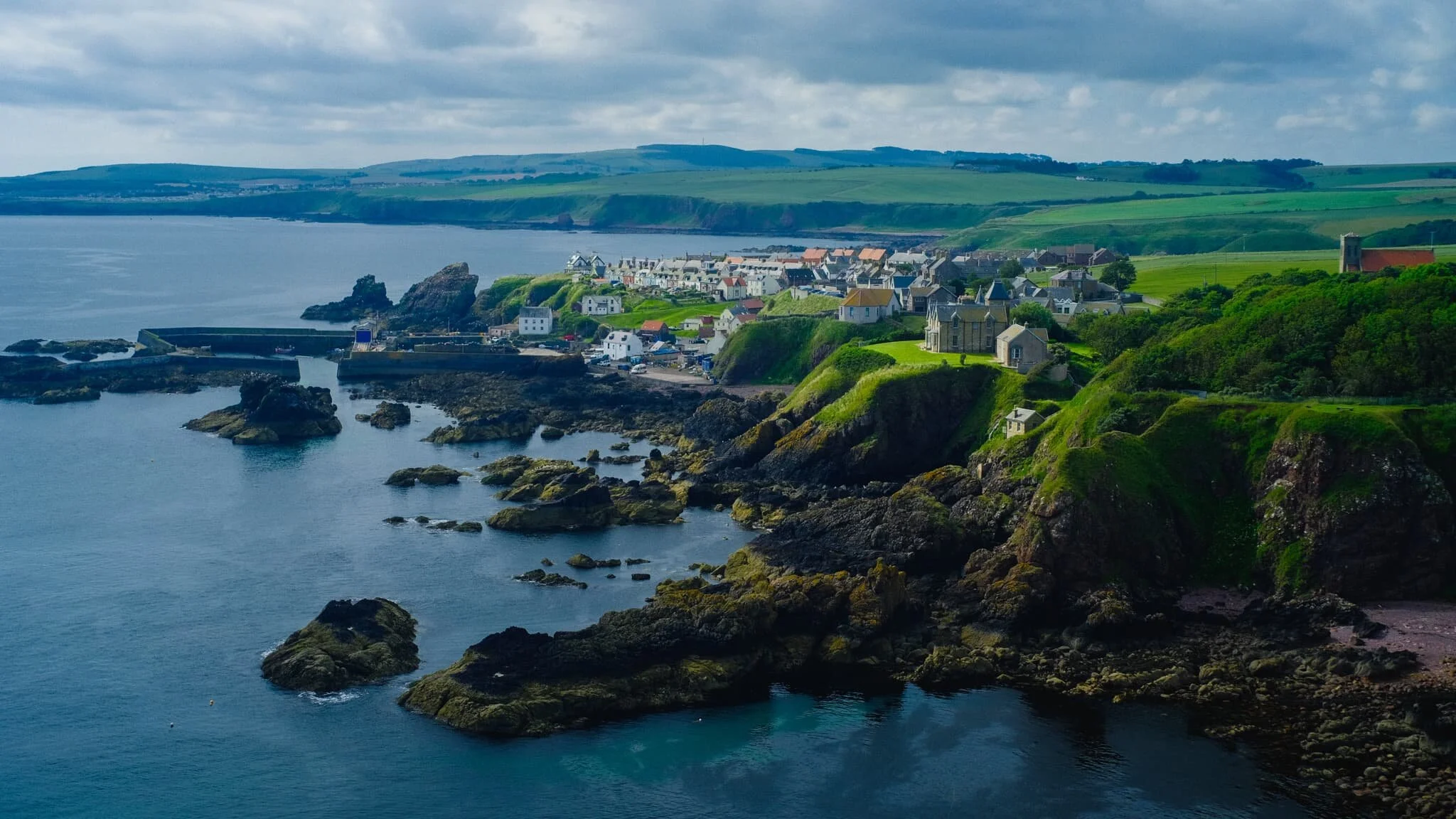  The footpath away from the village quickly gains height, and the views back to St. Abb&rsquo;s immediately open up. The sun broke through the clouds briefly, highlighting the cliffs of the village and rendering this scene with an almost improbable painterly quality. 