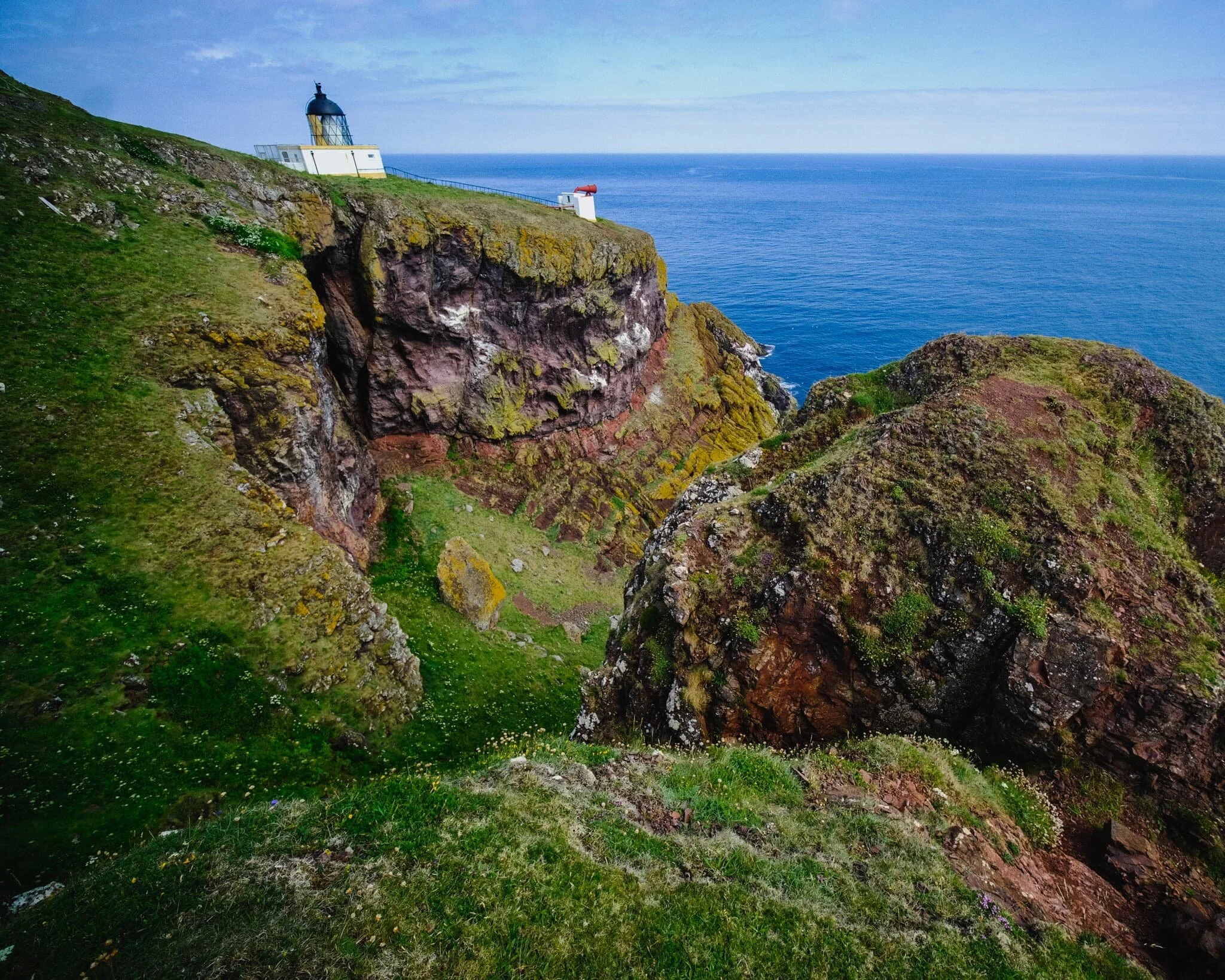  As we climb up St. Abb&rsquo;s Head, the lighthouse comes into view. We hang around the cliff edges above Clafferts Rock for some compositions involving the lighthouse. 