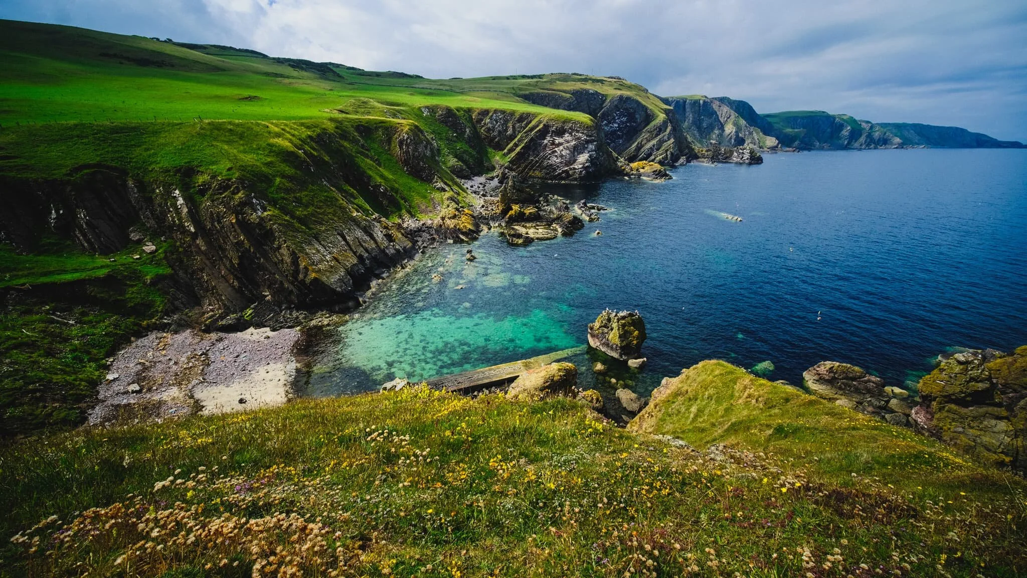 And there it is. Pettico Wick Bay and the twisted cliffs of Uilystrand Brae on a perfect summer&rsquo;s day. 